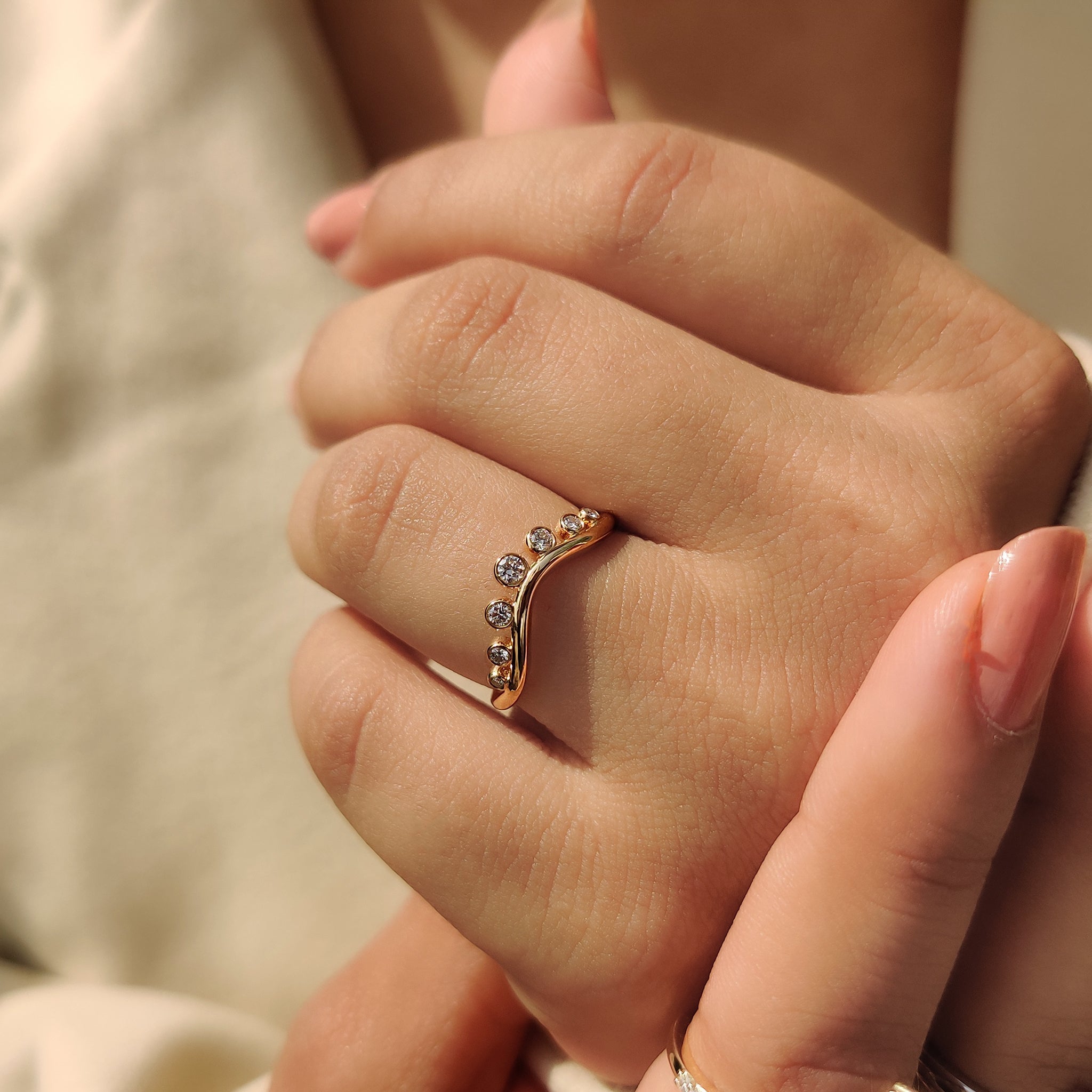 Yellow gold band with lab grown diamonds.