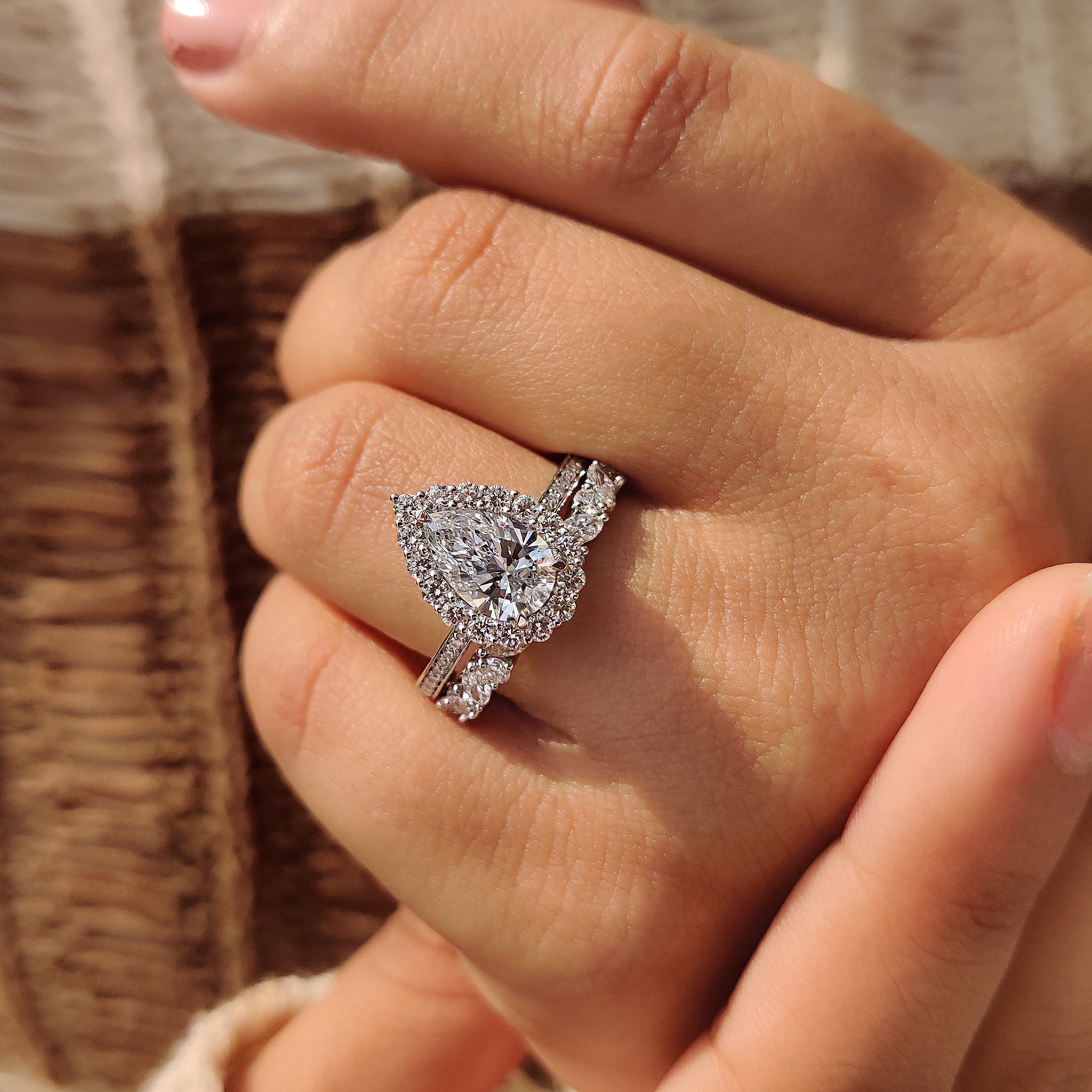 Three prong pear engagement ring