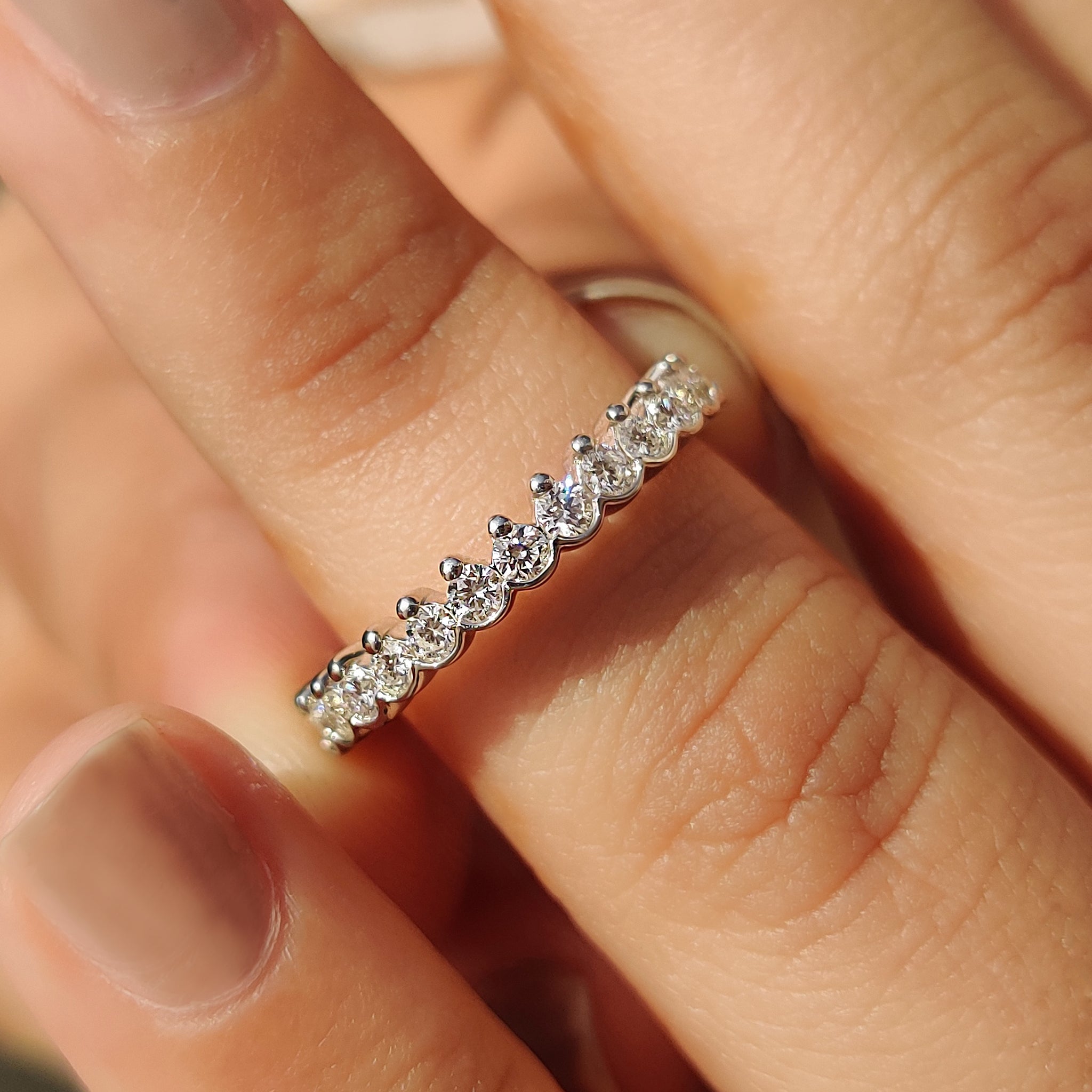 White gold prong setting band with lab grown diamonds.
