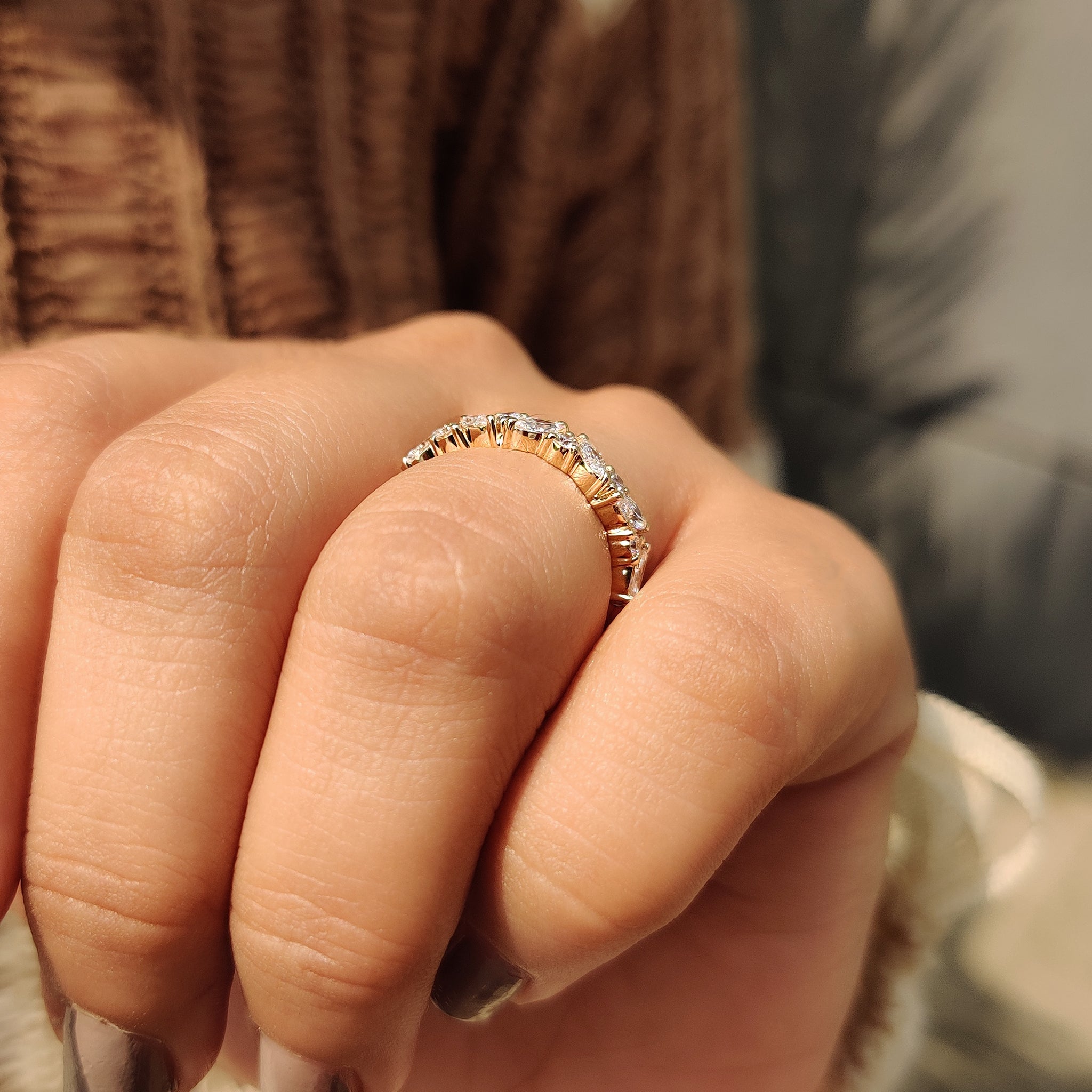 Yellow gold wedding band with lab grown diamonds.
