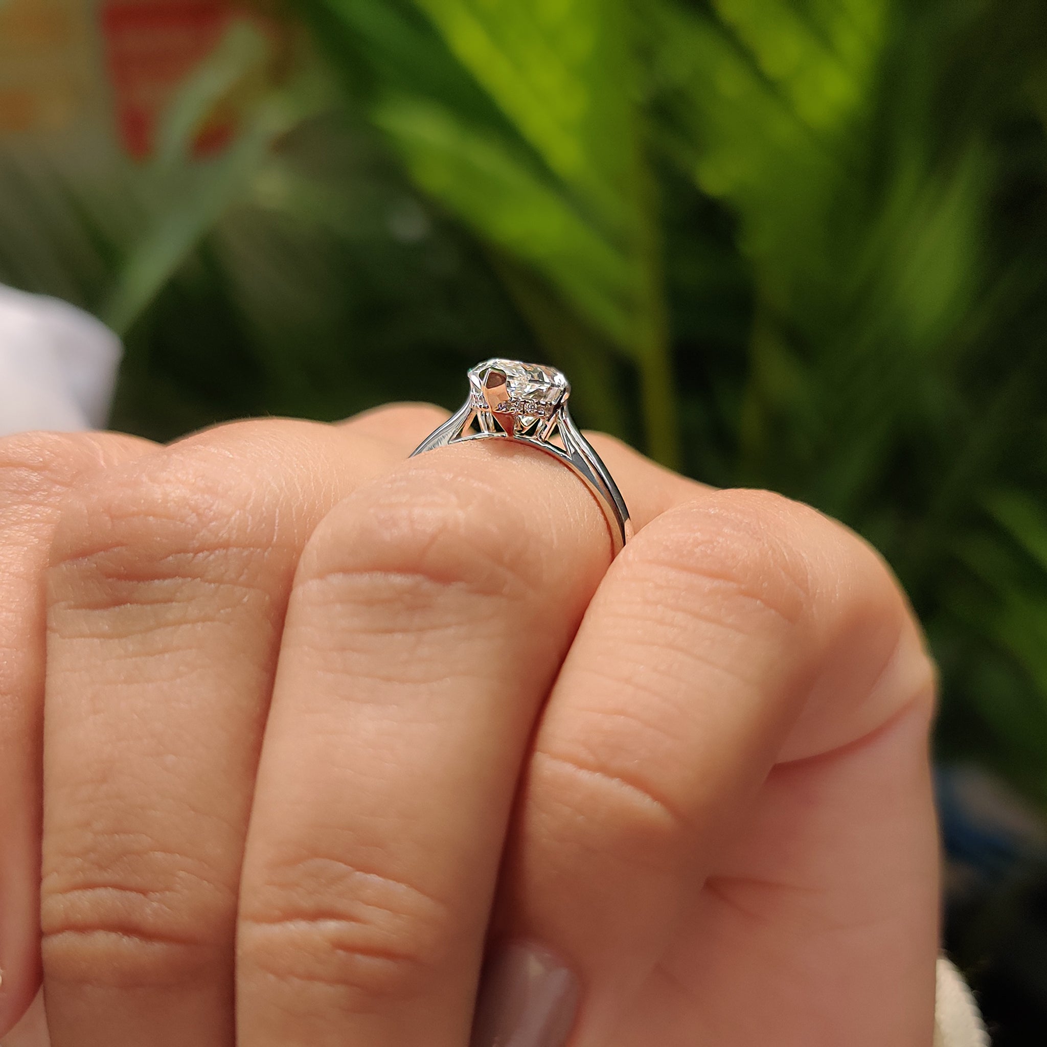 Handmade jewelry with carat diamonds engagement ring.
