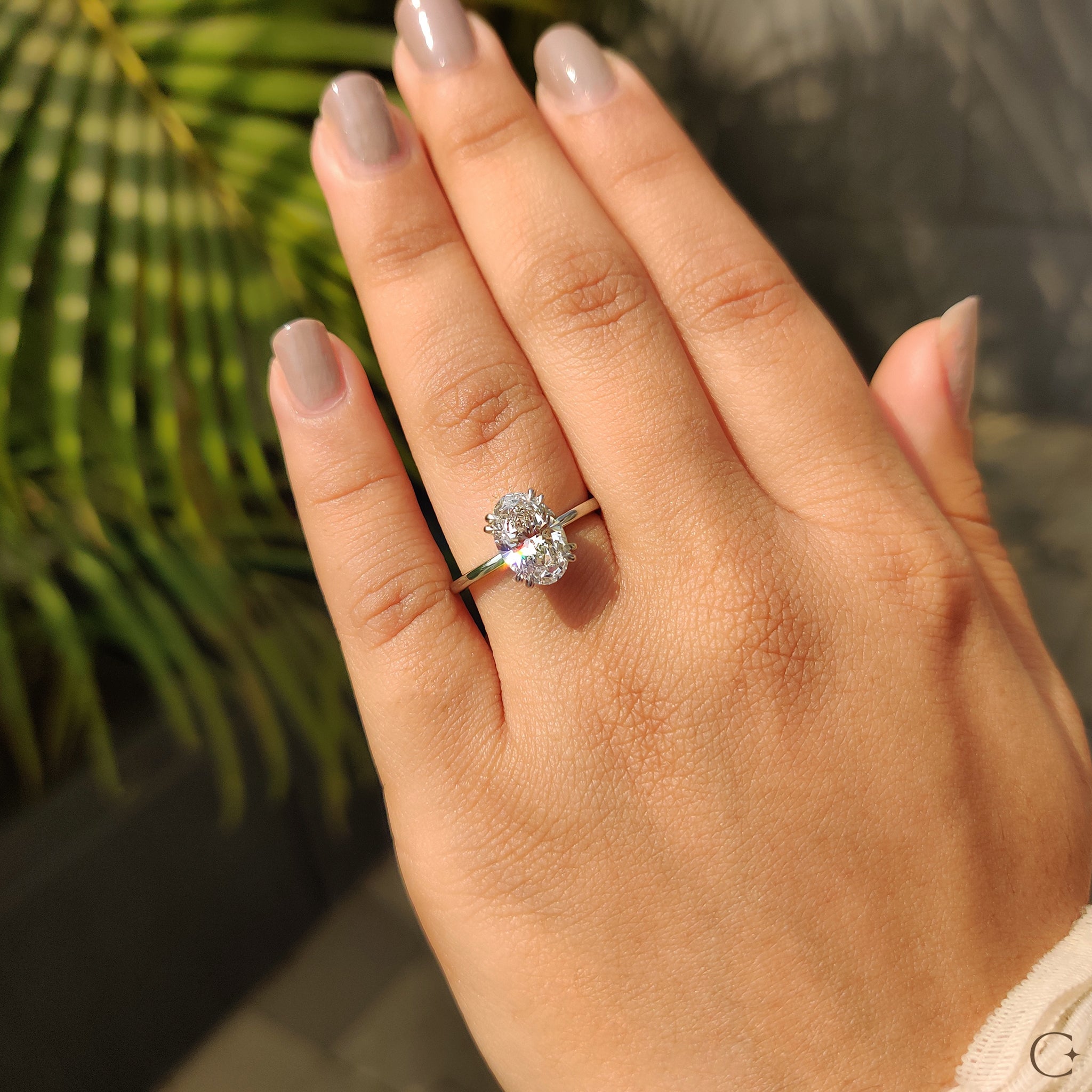 Oval Shaped Diamond Engagement Ring In Solitaire Style