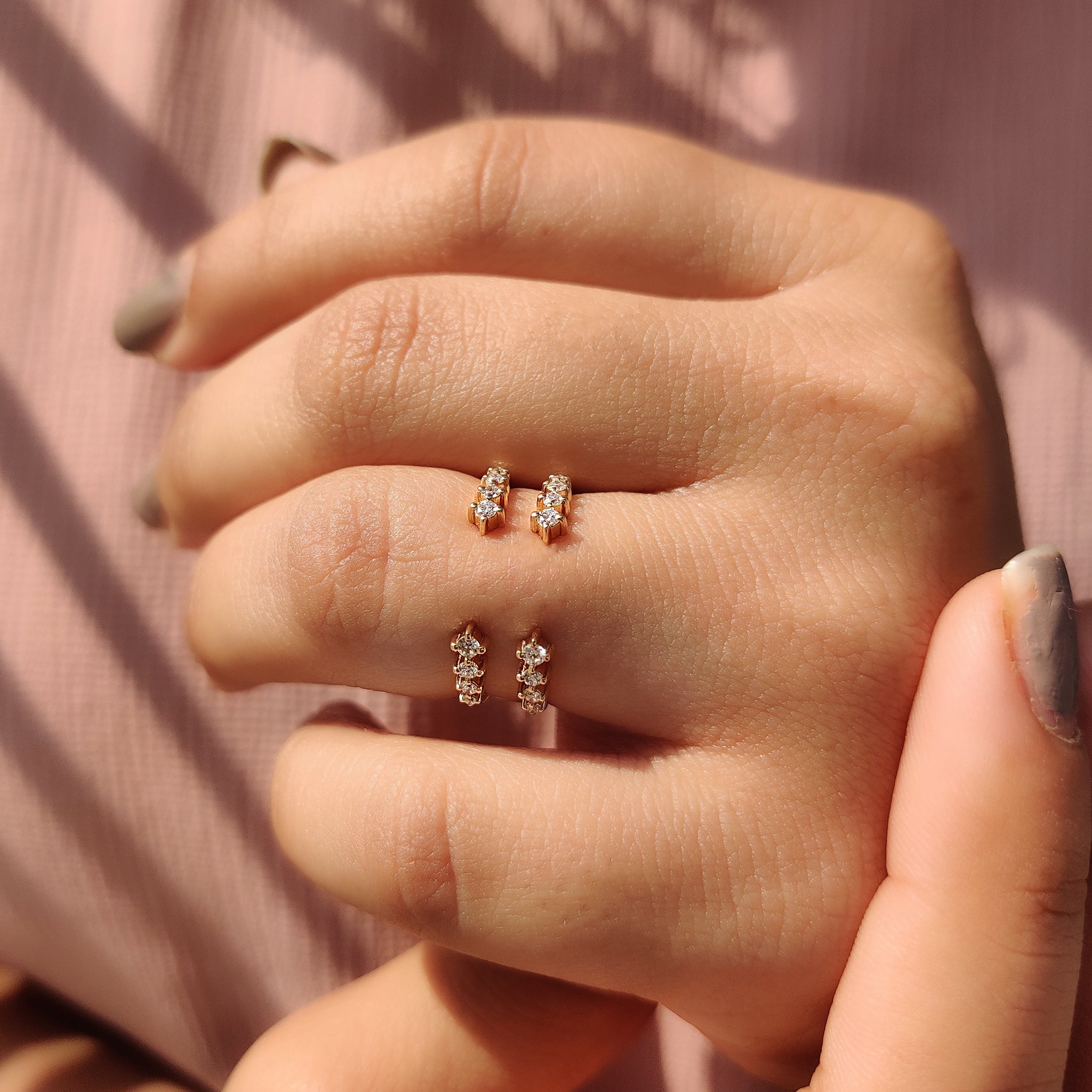 Round diamond wedding band with a prong set design.
