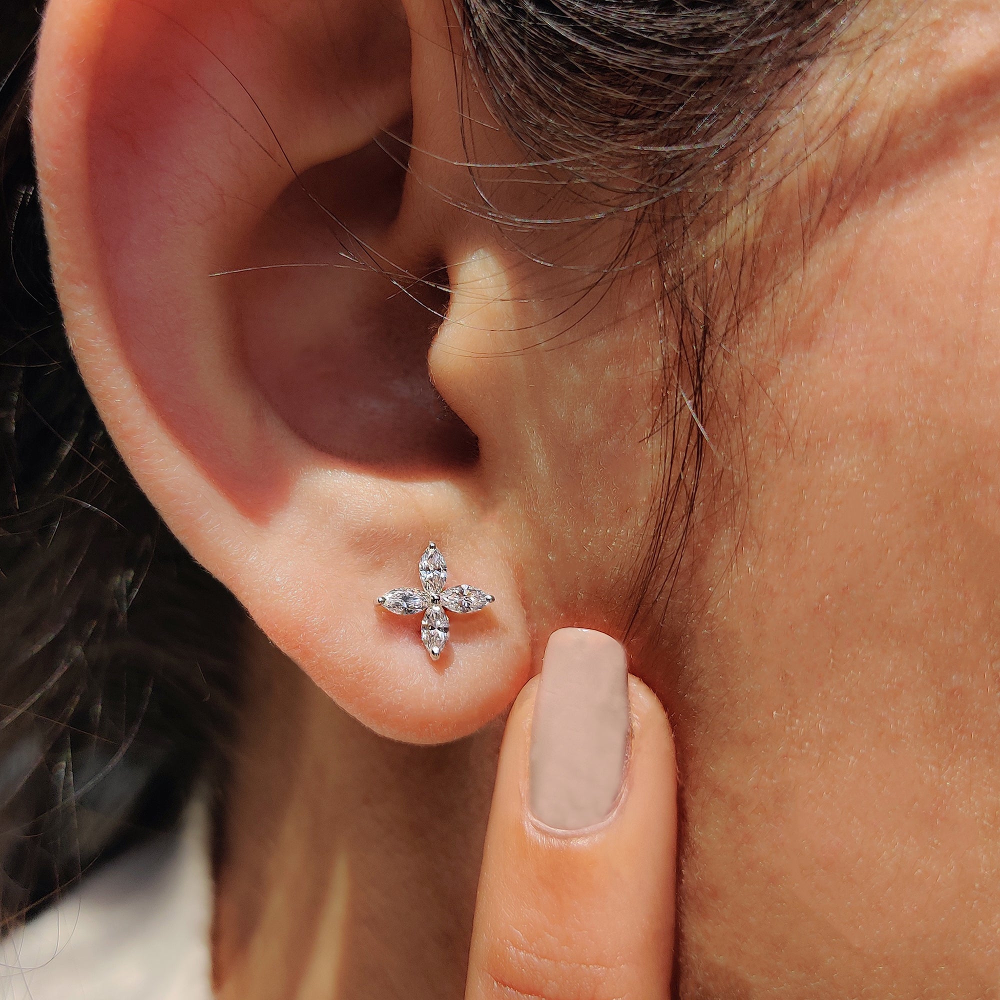 White gold earrings with marquise cut diamonds.