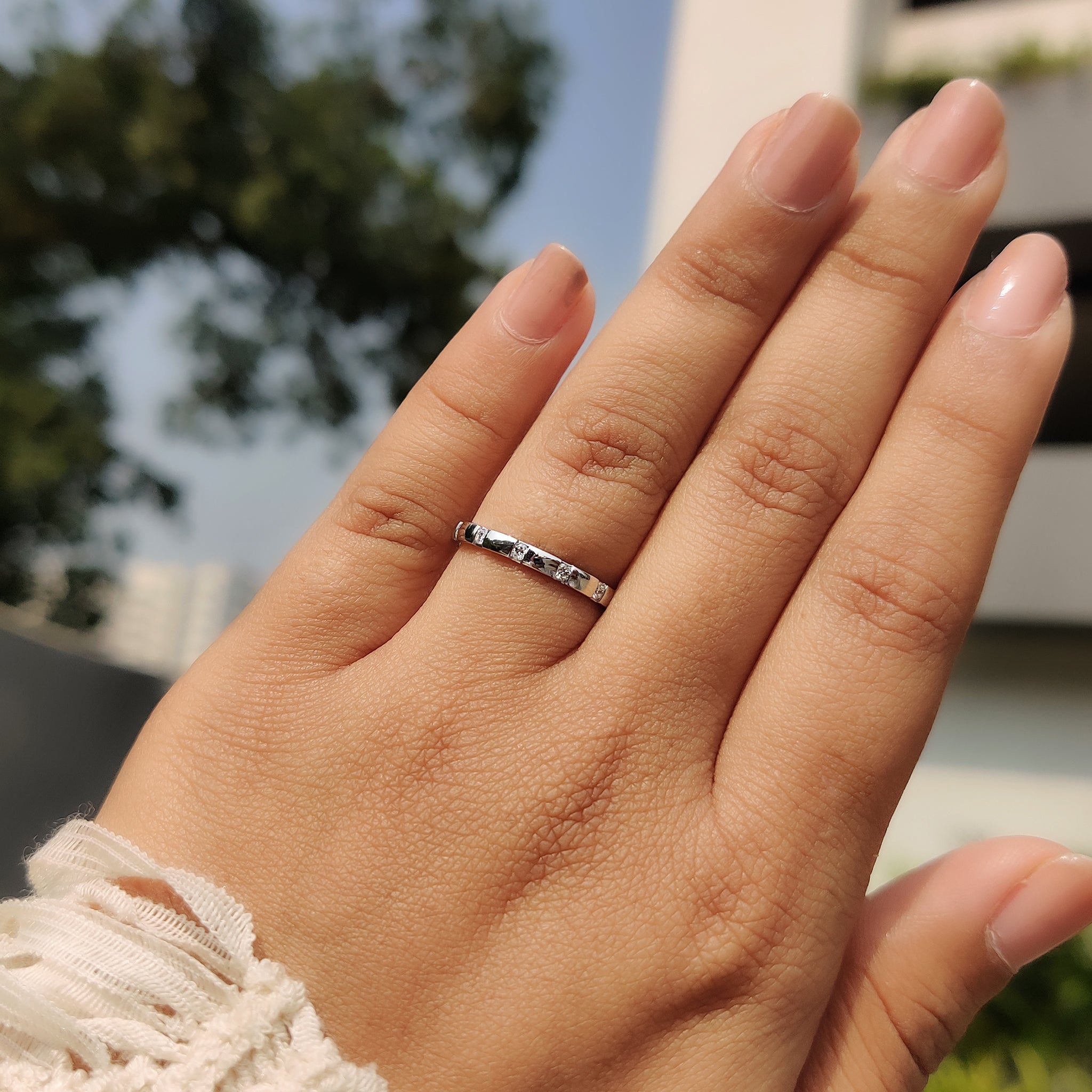 White gold band with a simple and elegant design.
