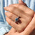 Round cut twisted pave set ring with twisted halo setting ring
