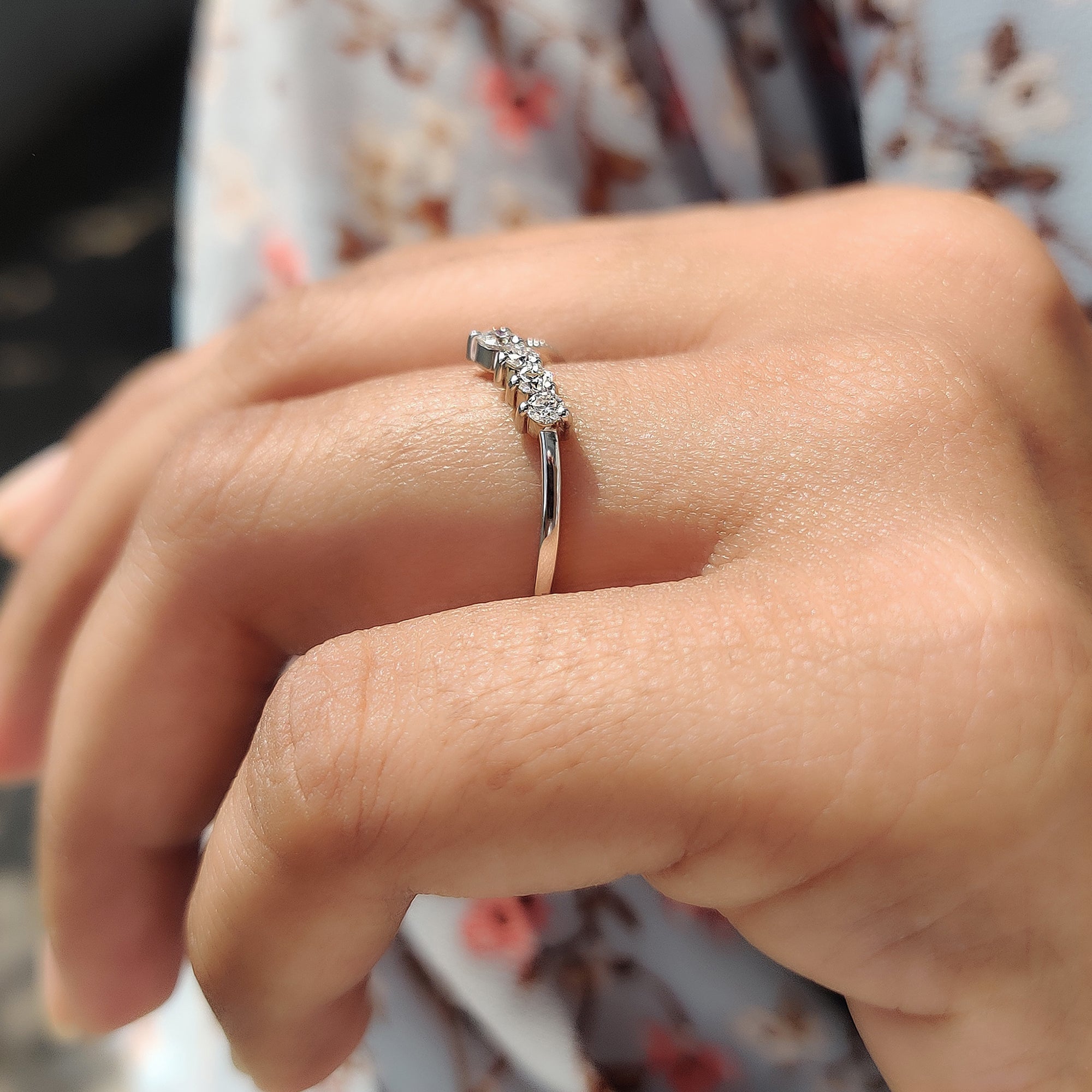 Vintage style round moissanite band with delicate milgrain setting.