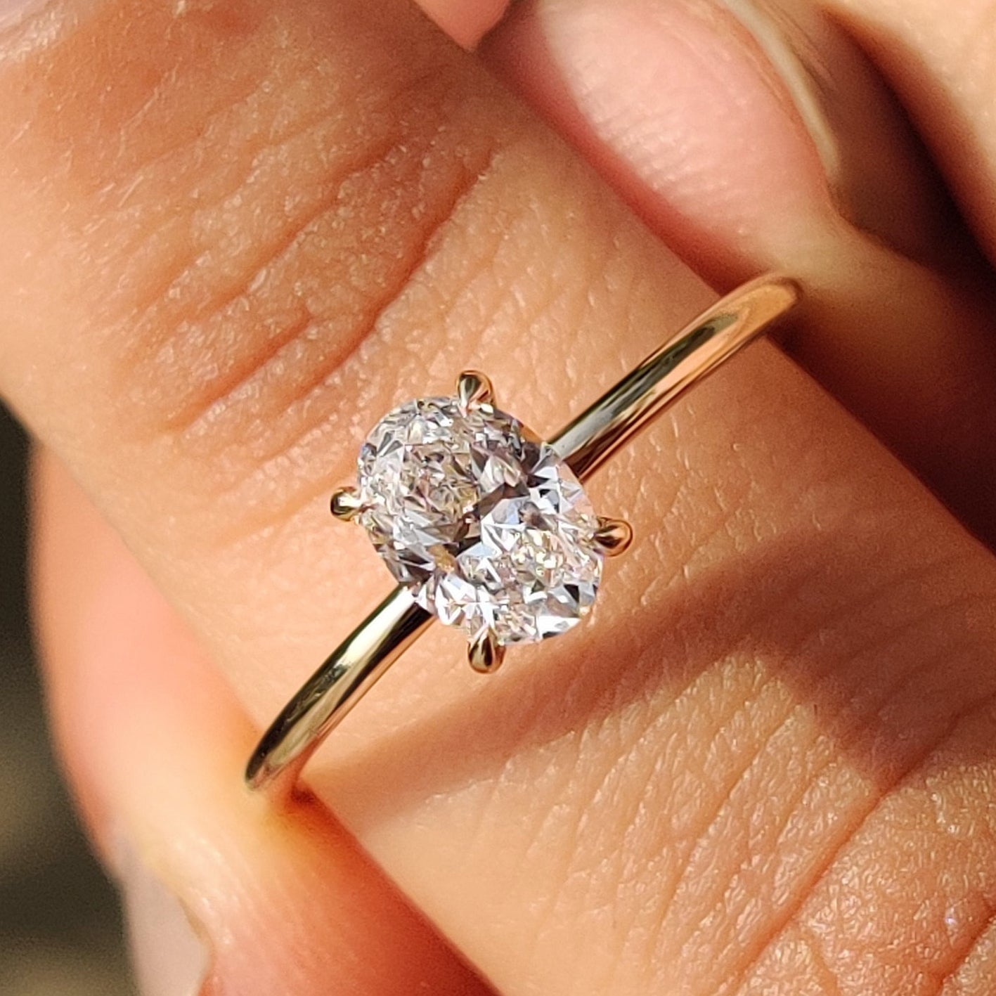 Oval Solitaire Engagement Ring with a Classic Style