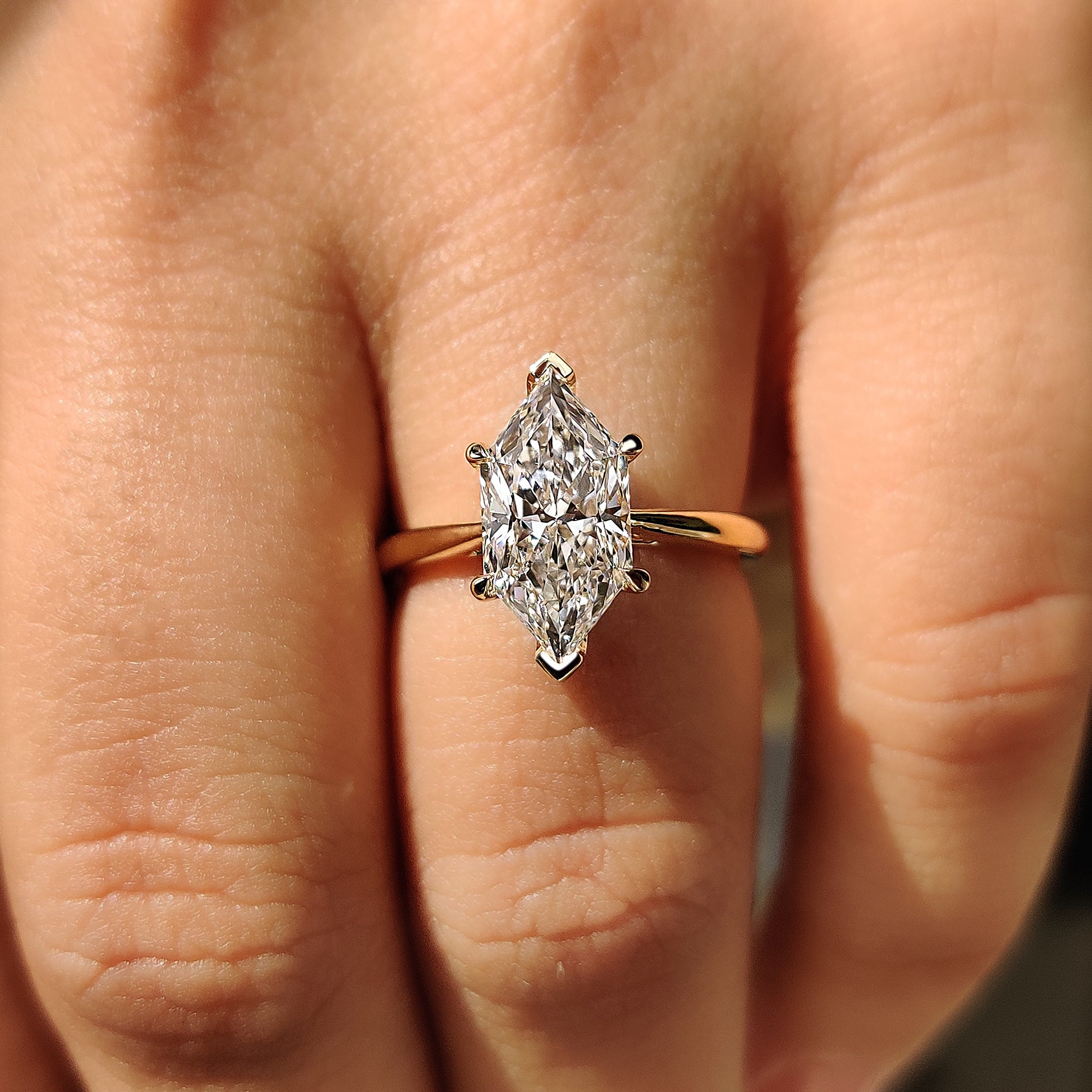 Yellow gold engagement ring with Lab Grown Diamond.