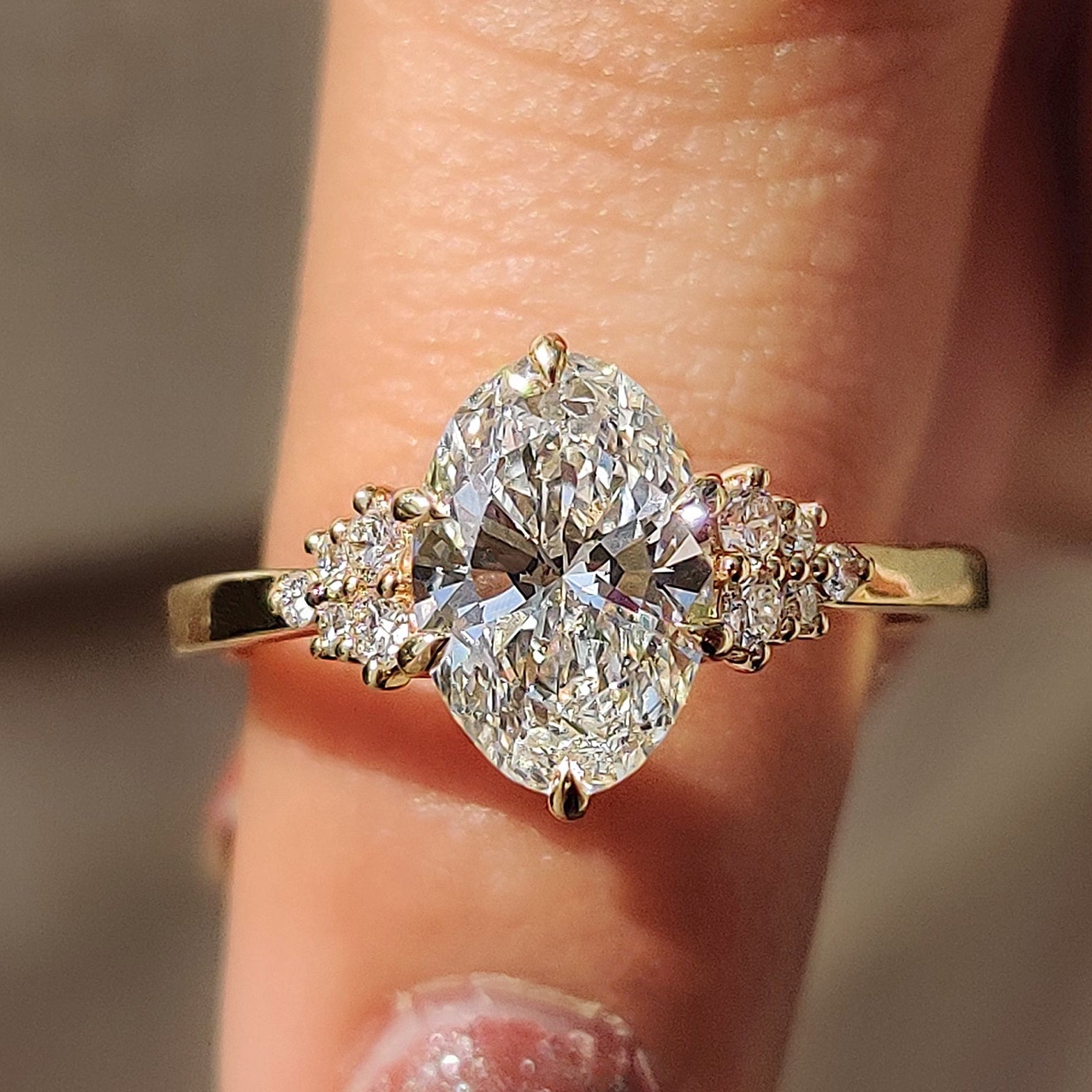 Oval diamond ring in a classic design.
