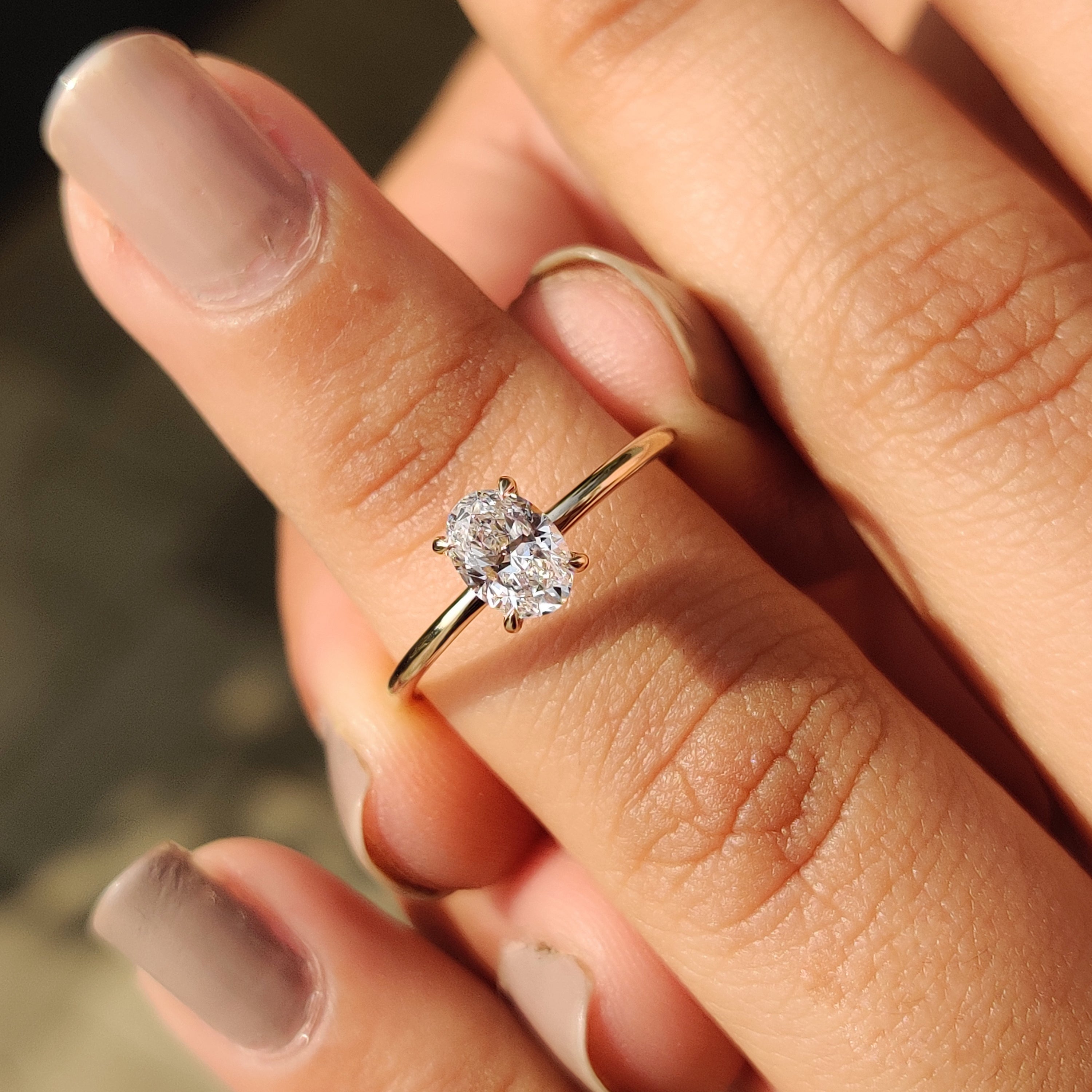 Oval Shaped Diamond Engagement Ring in Solitaire Setting