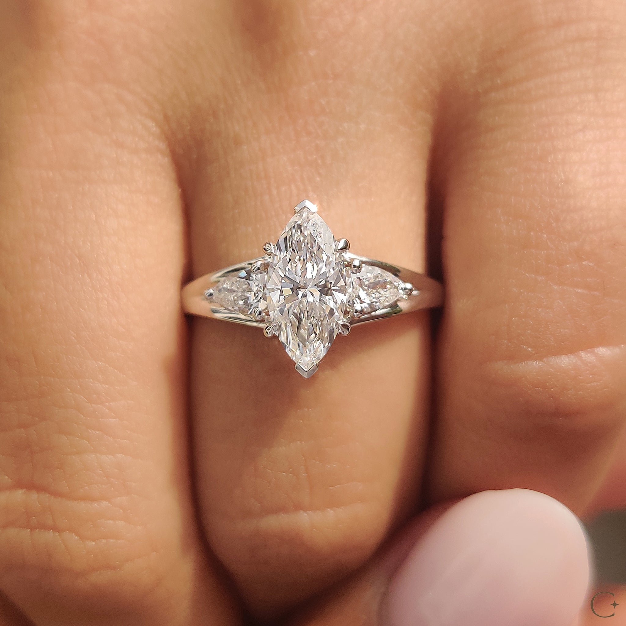 3 stone engagement ring with lab grown diamonds.
