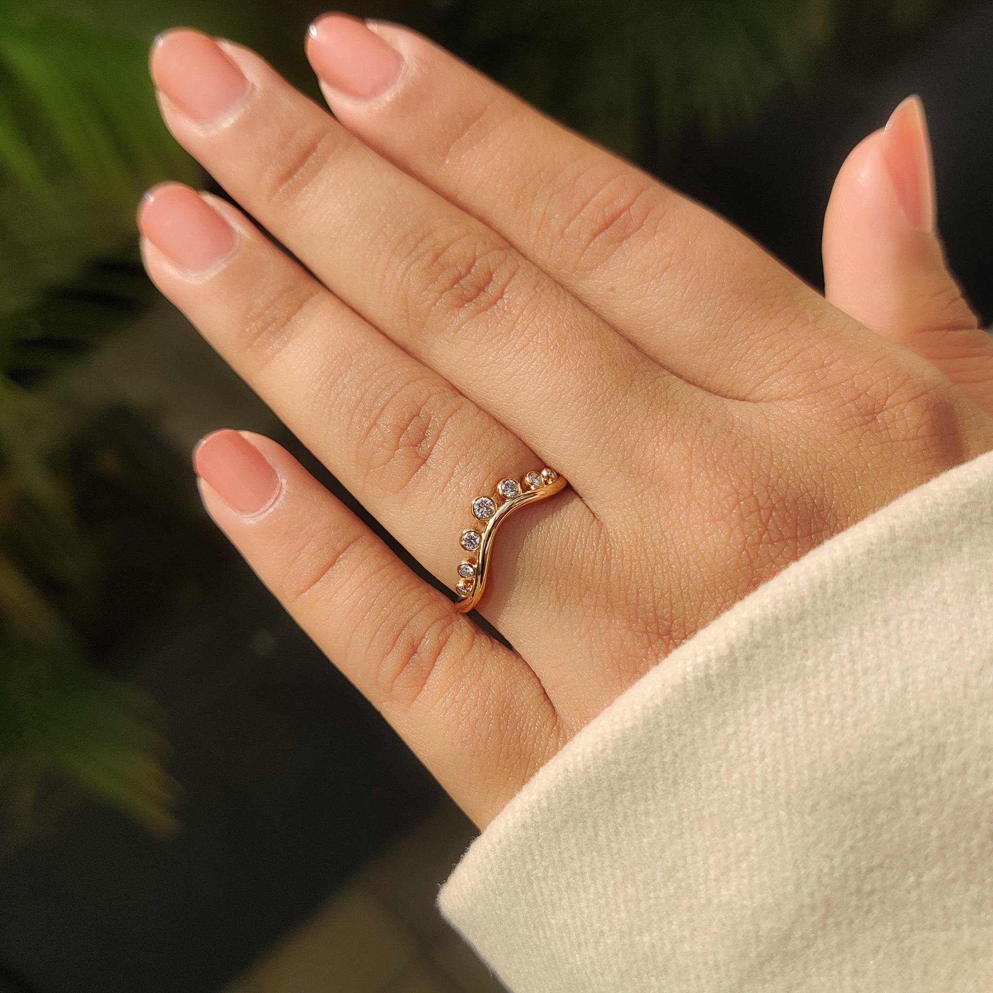 Simple curved wedding band.