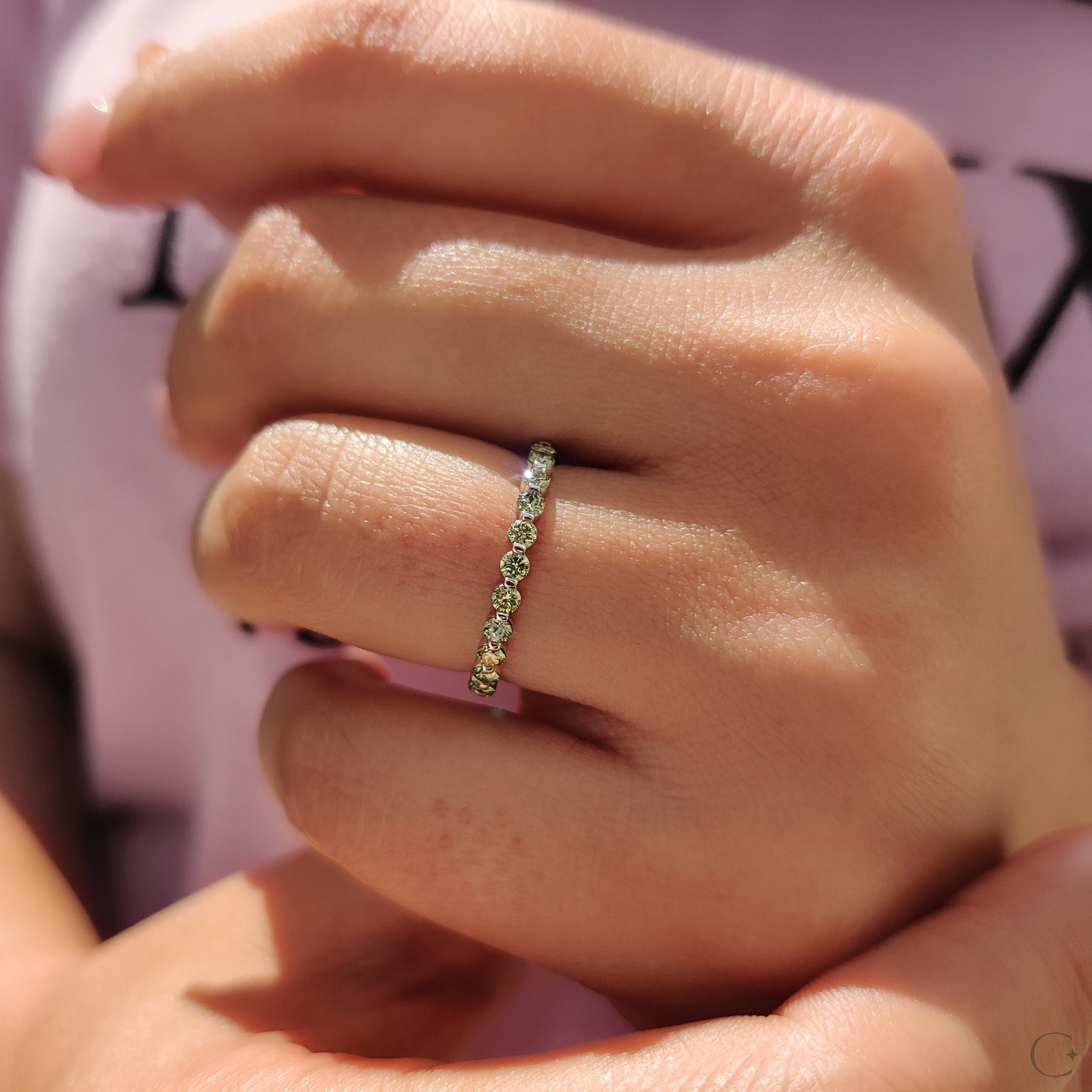 White gold diamond band with a smooth and polished finish.
