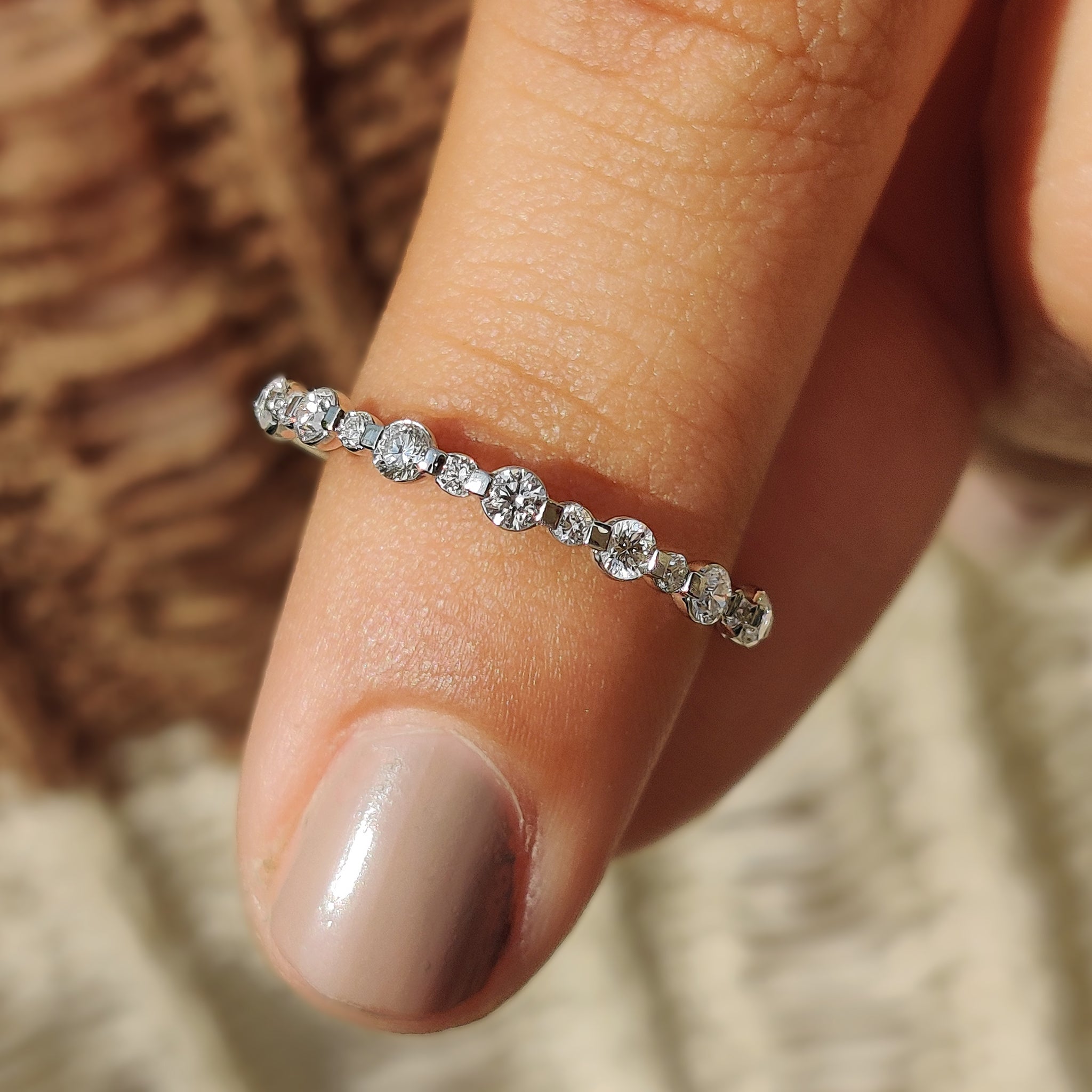 Carat Diamonds Wedding Band with prong setting.

