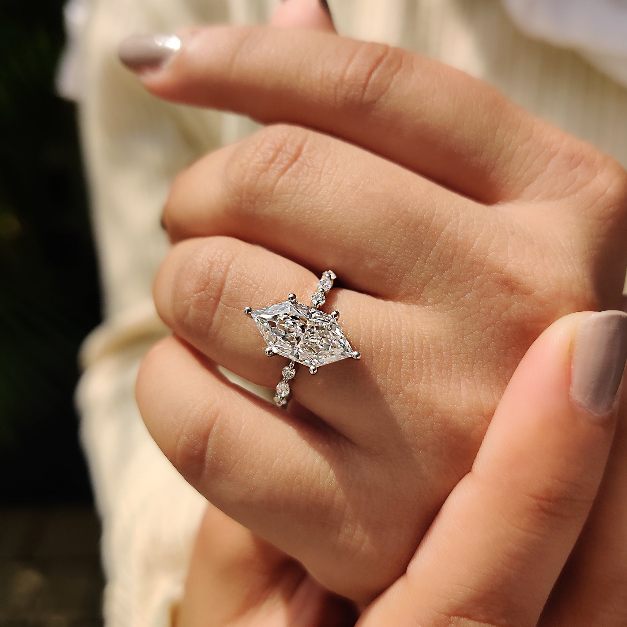 Lab grown diamond with marquise engagement ring.
