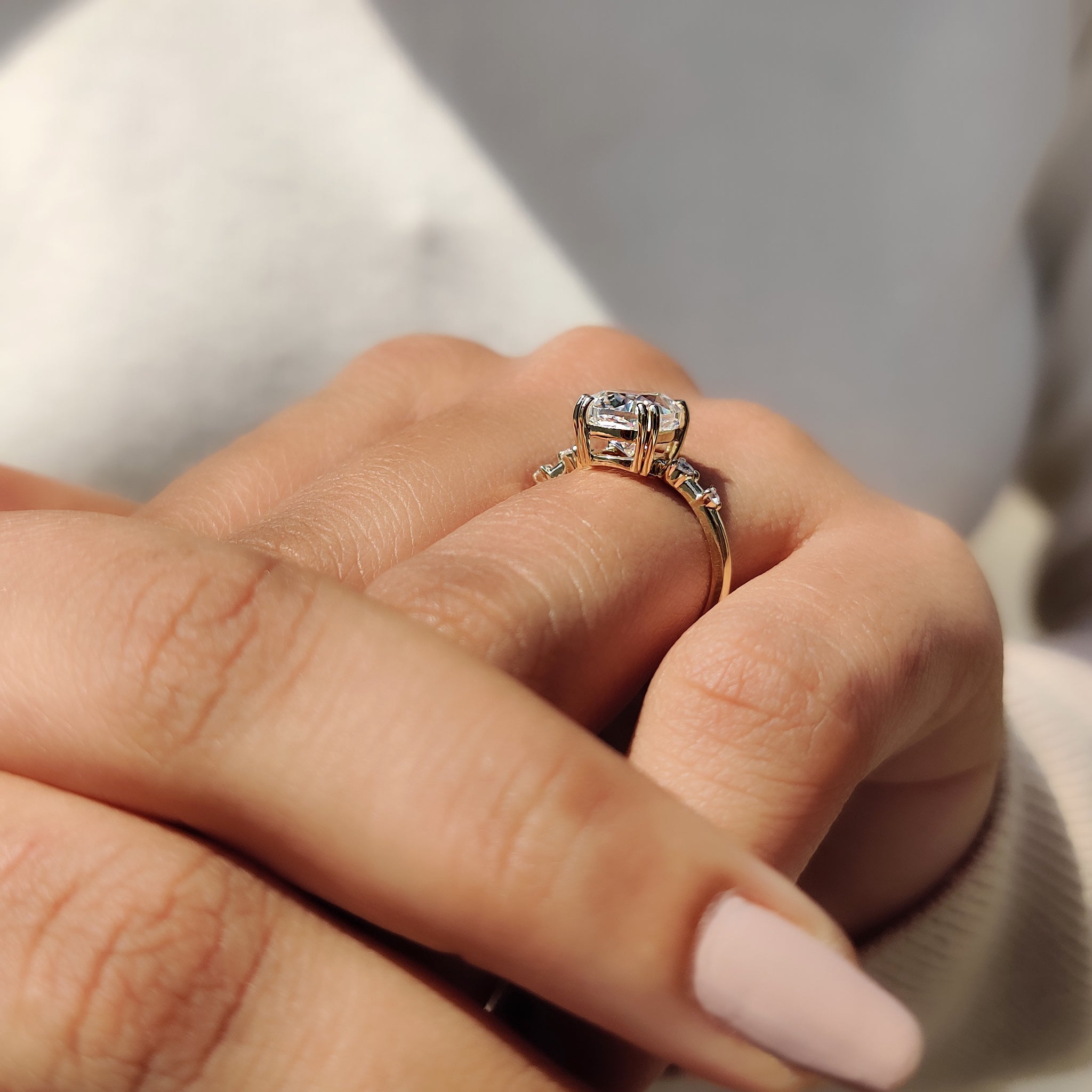 Buy engagement ring with 4 round cut moissanite.
