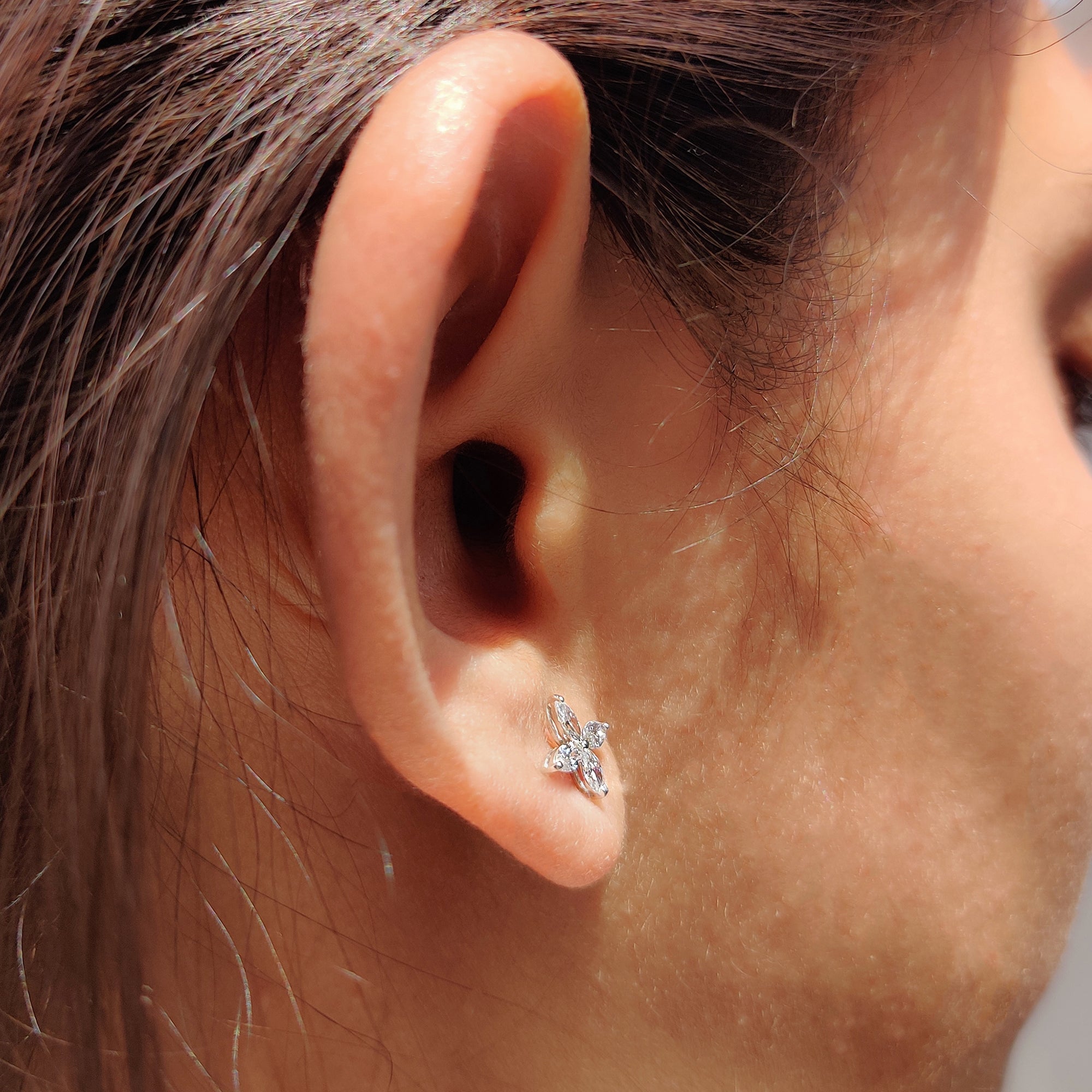Simple diamond stud earrings for daily wear.