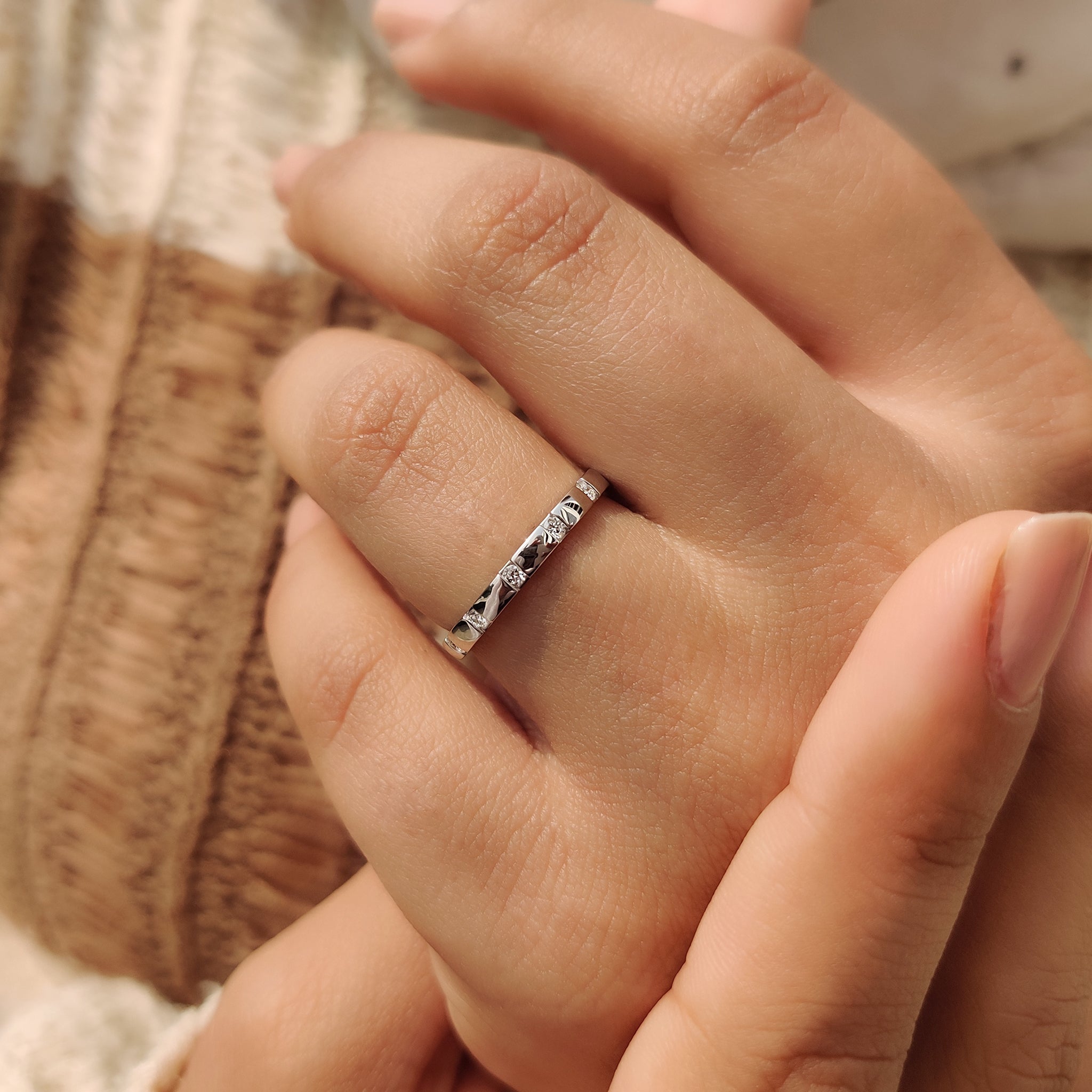 Round cut eternity band with shimmering round diamonds set all around.

