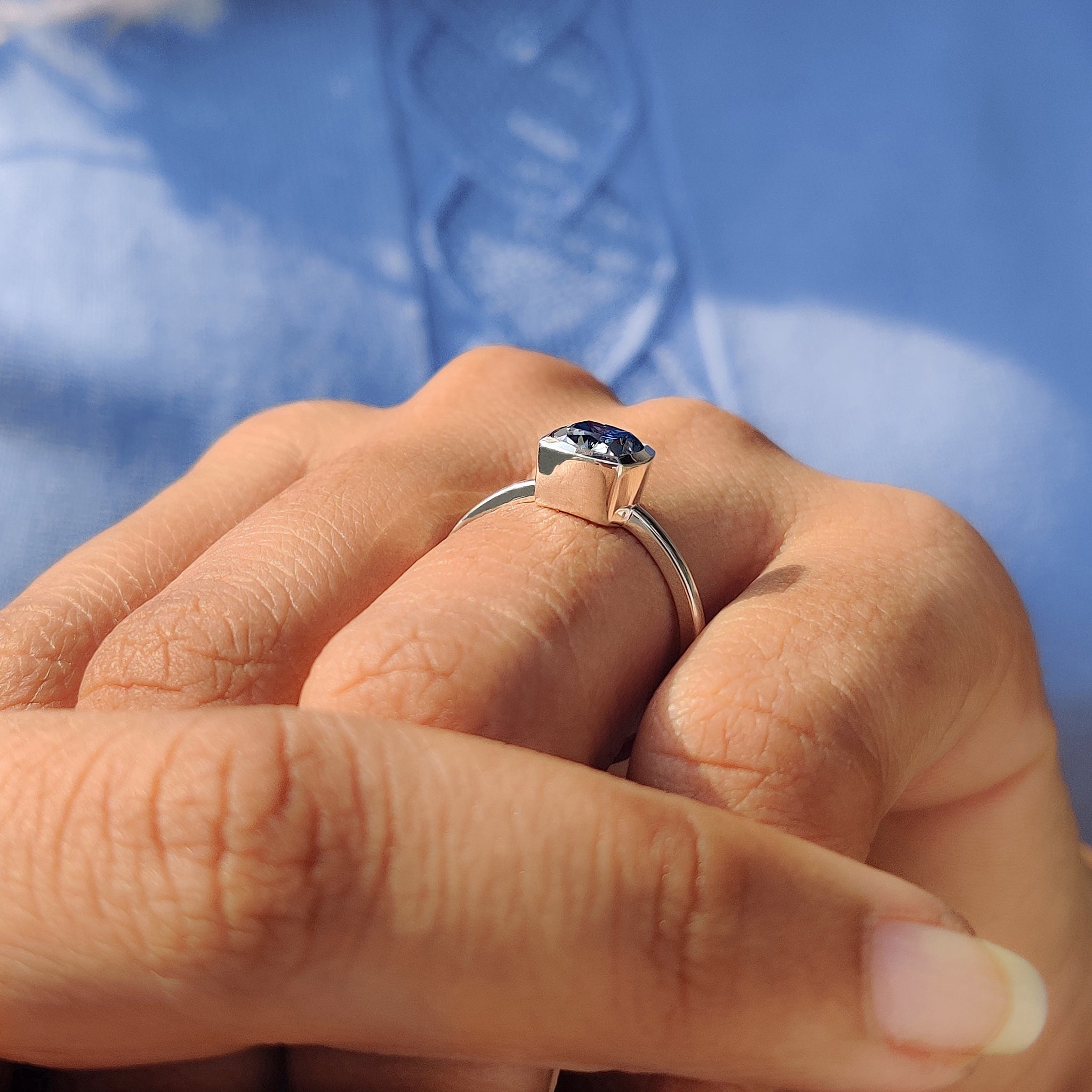 Royal dark blue ring glows with rich deep color.
