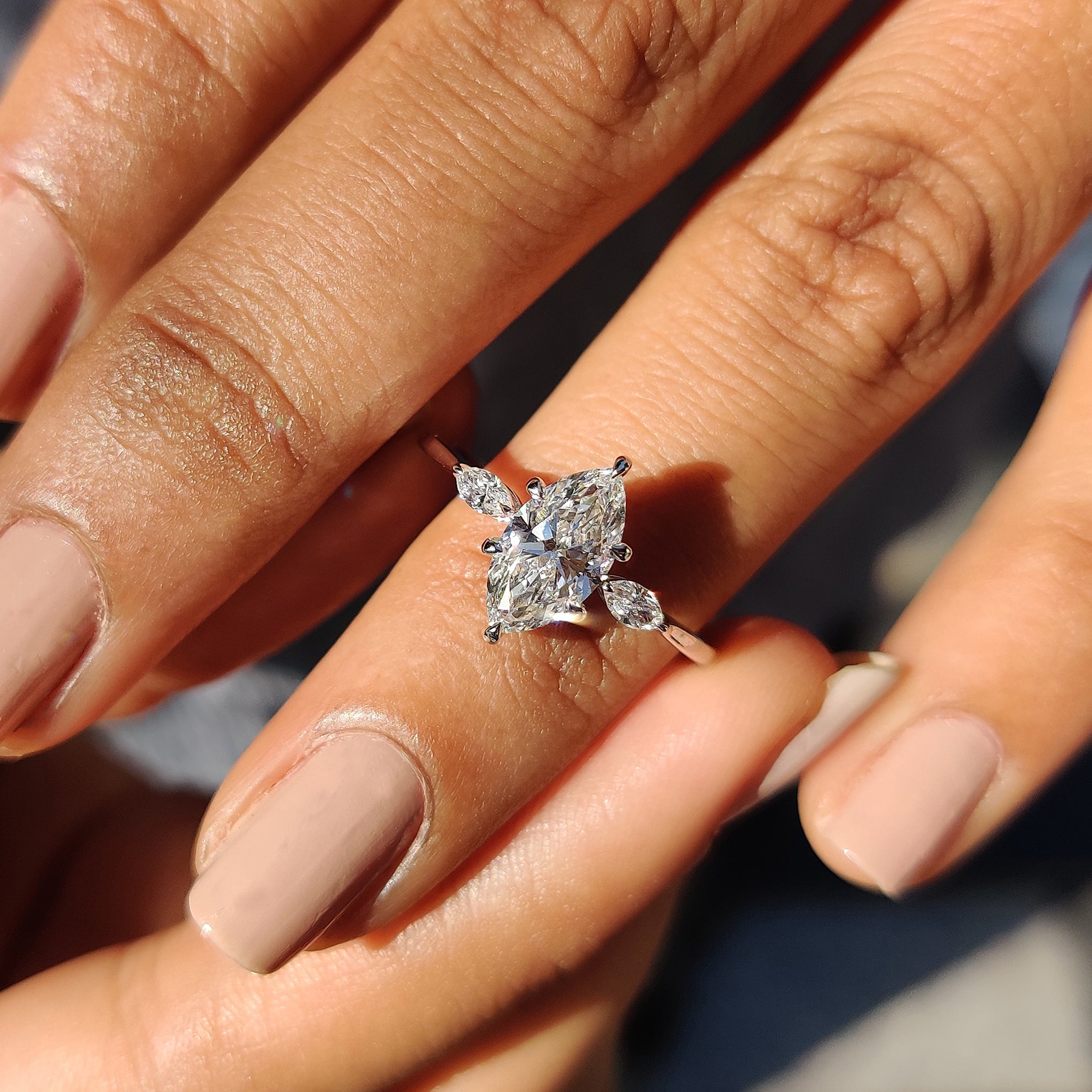 Stunning 3 stone engagement ring with white gold band.
