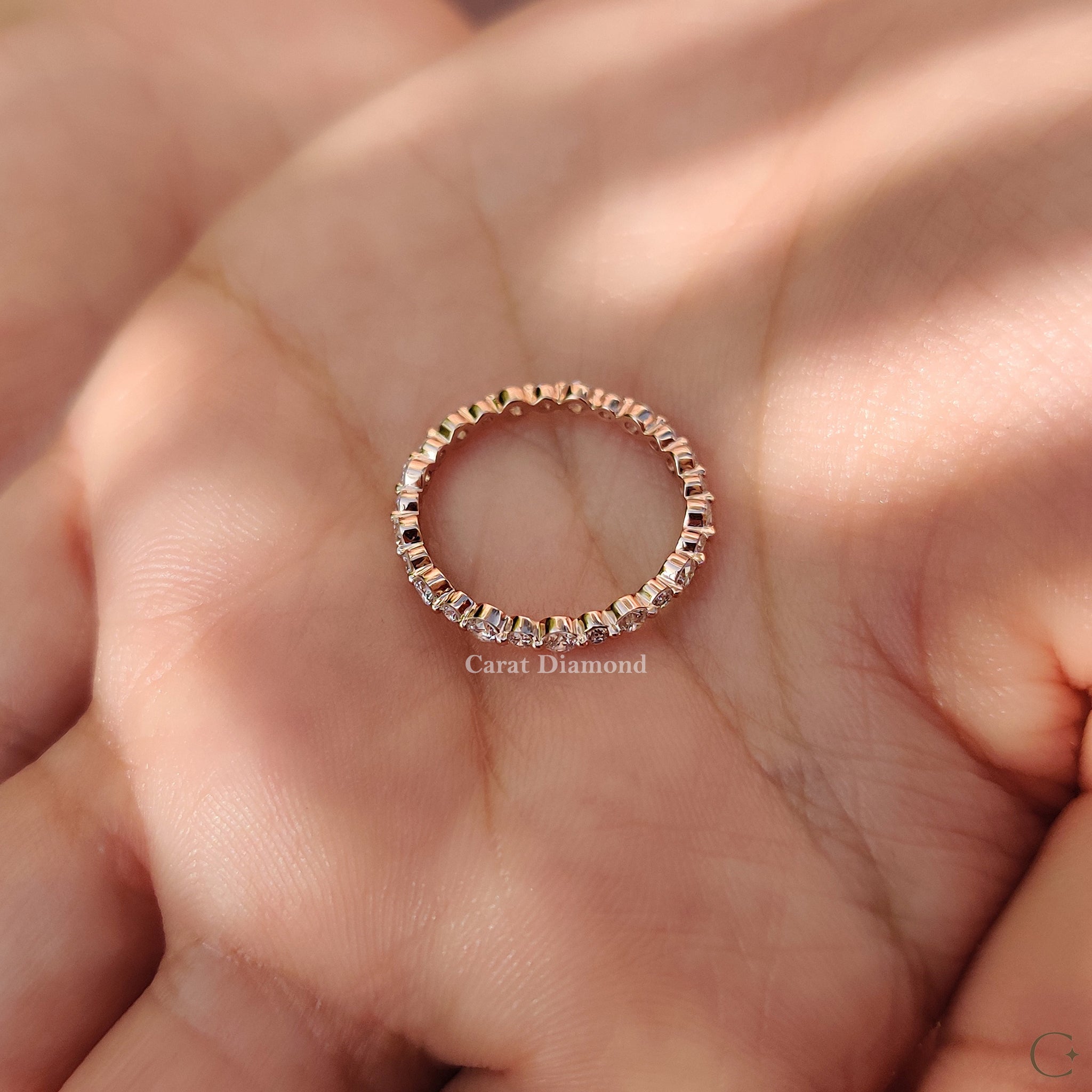 Lab-grown diamond rose gold wedding band for women.