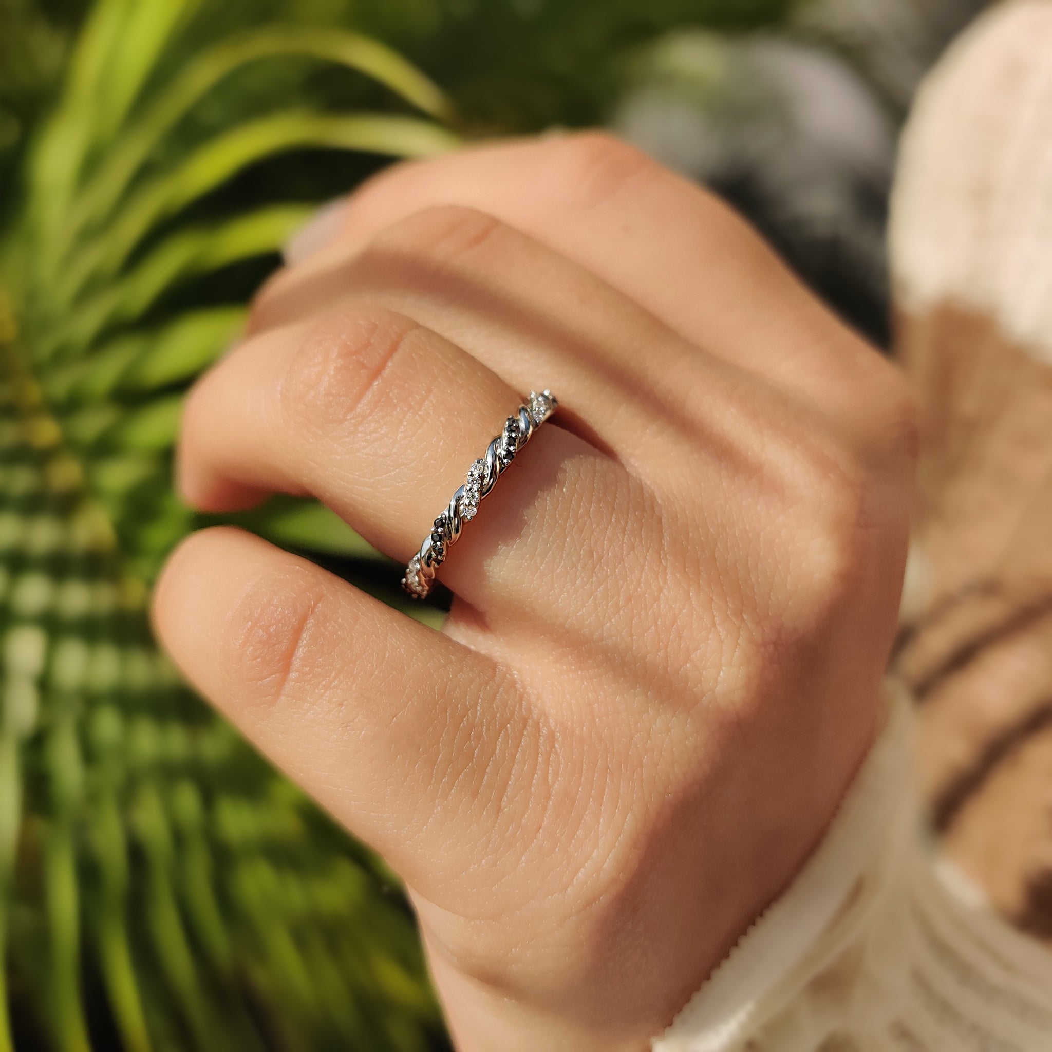 Handmade jewelry with twisted gold design.
