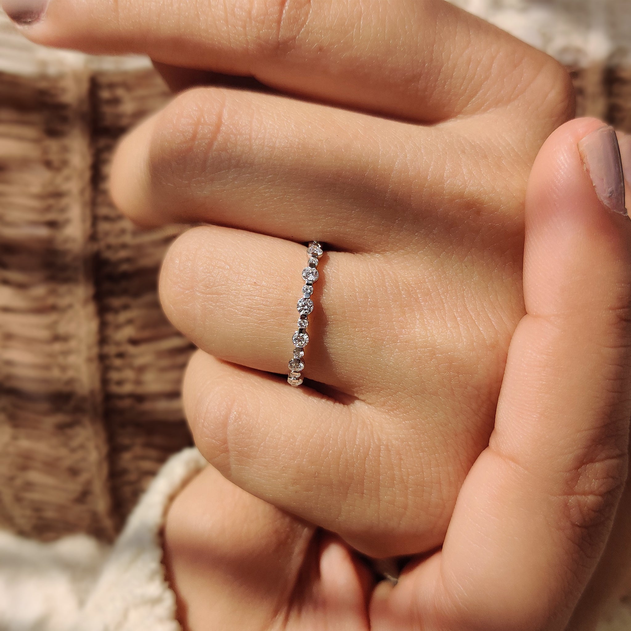 White Gold Wedding Band featuring round cut diamonds.
