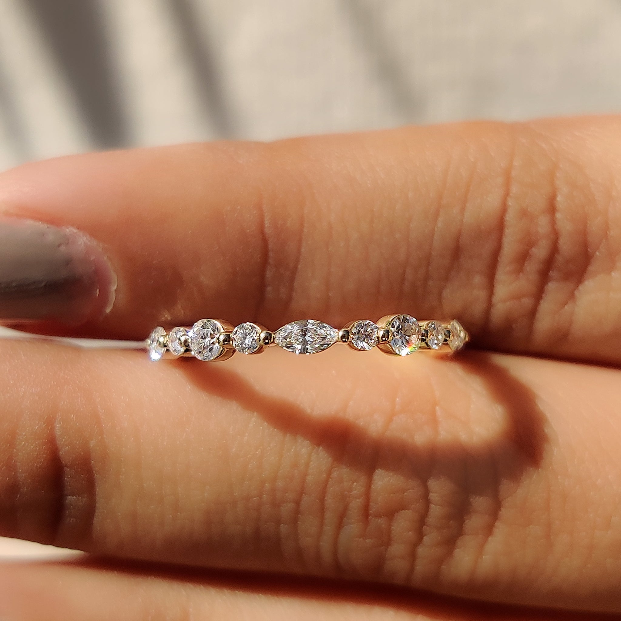 Custom marquise diamond wedding band.
