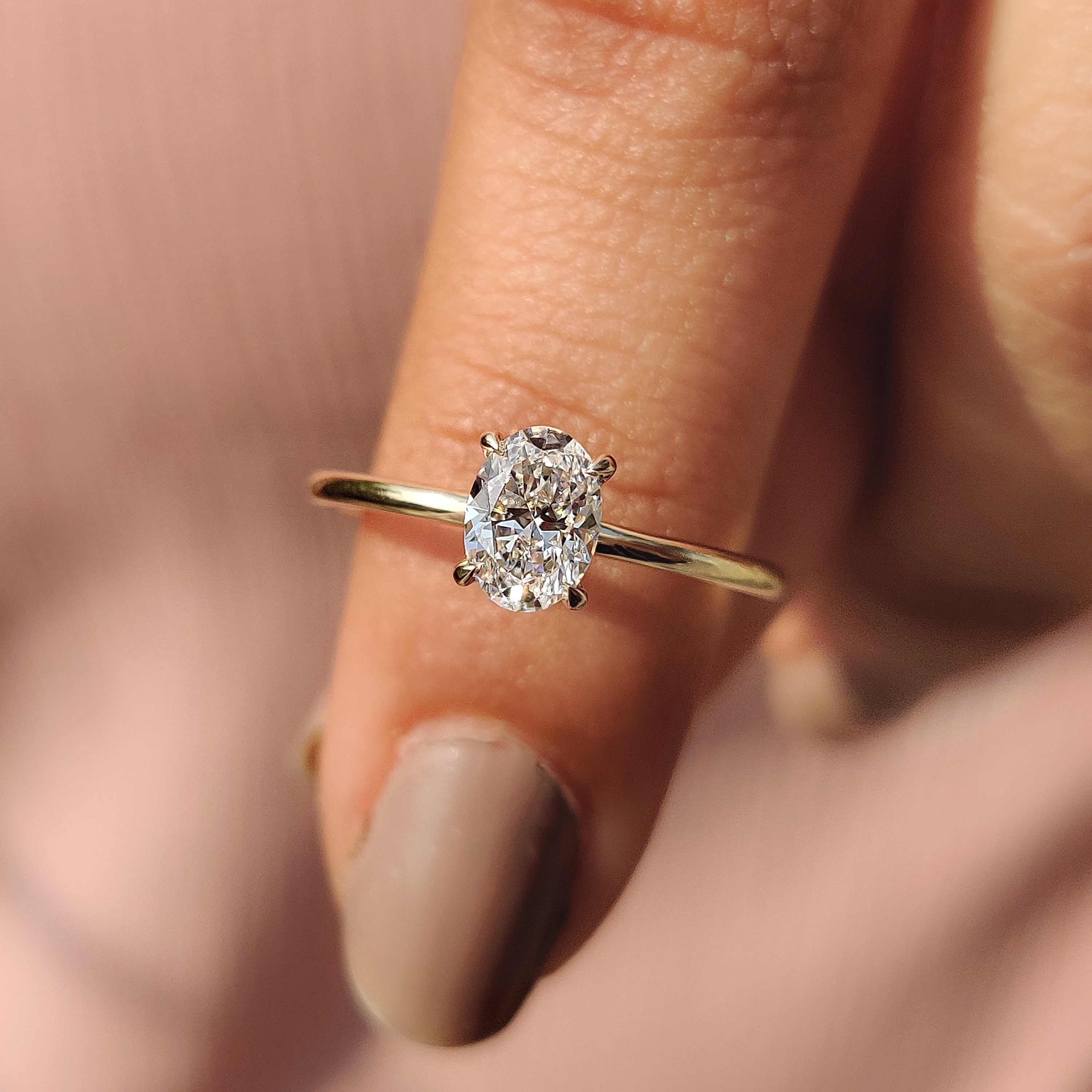 Oval Solitaire Engagement Ring with a Classic Style
