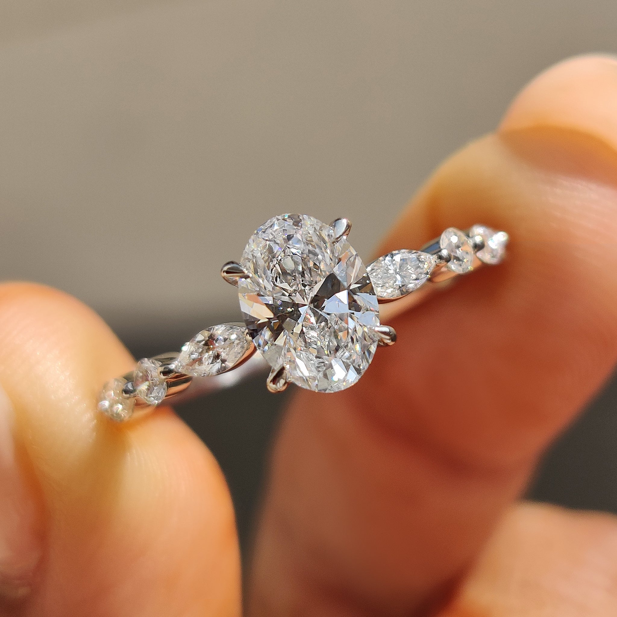 Oval cut engagement ring with a sleek design.