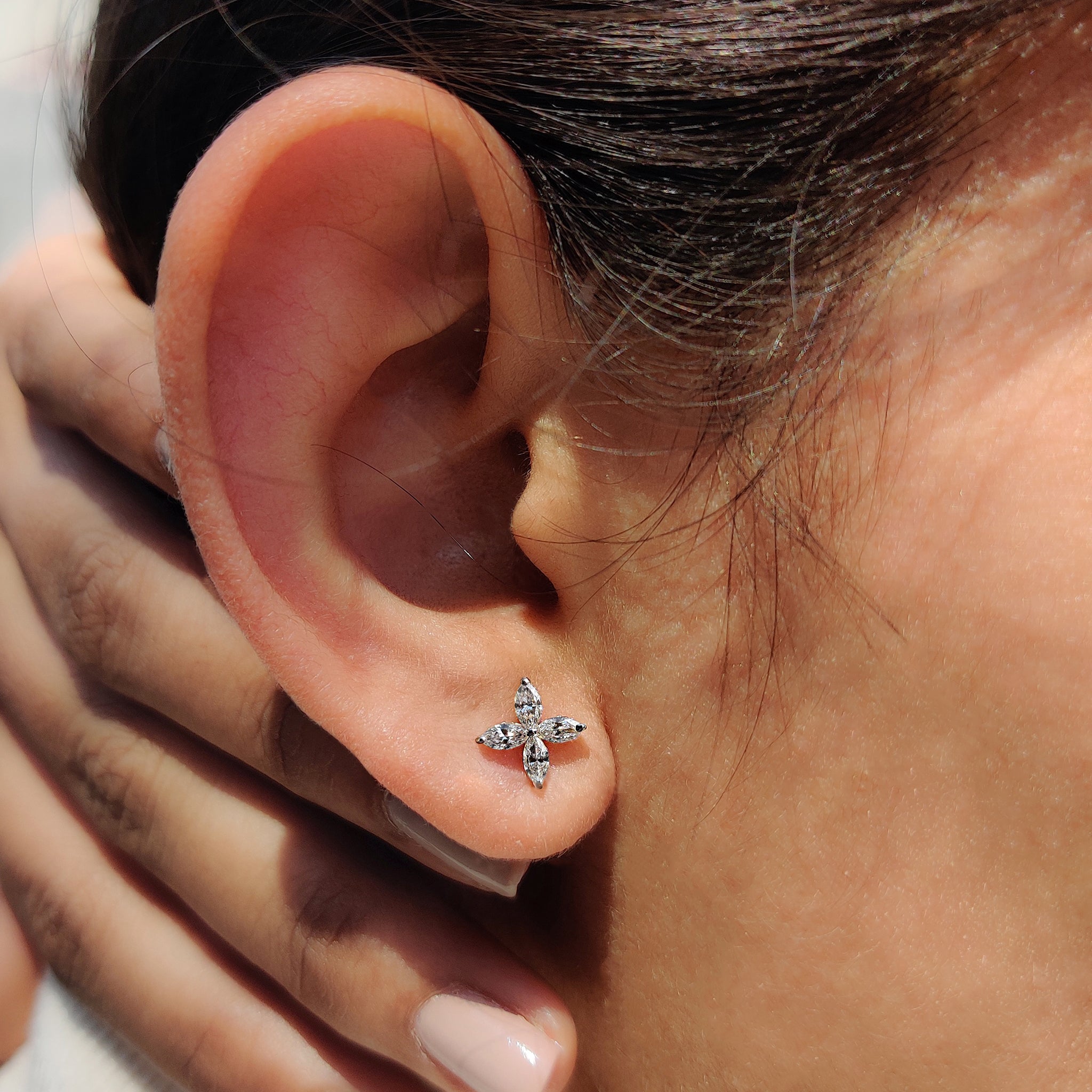 Carat Diamonds marquise cut earrings.