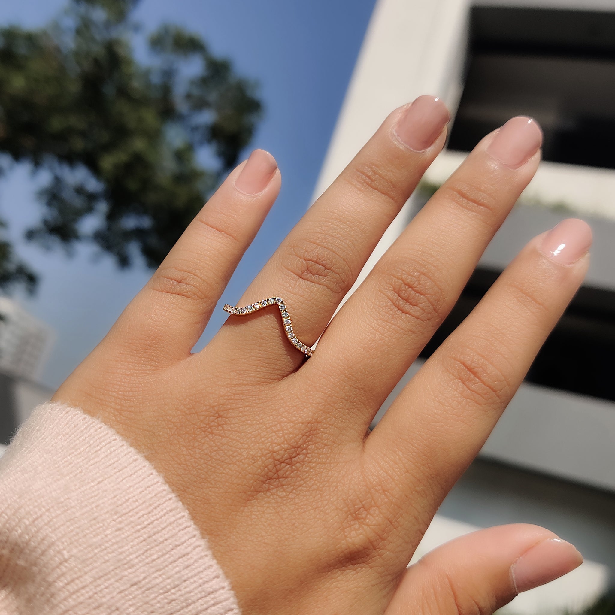 Sophisticated V shaped band designed to complement engagement rings effortlessly
