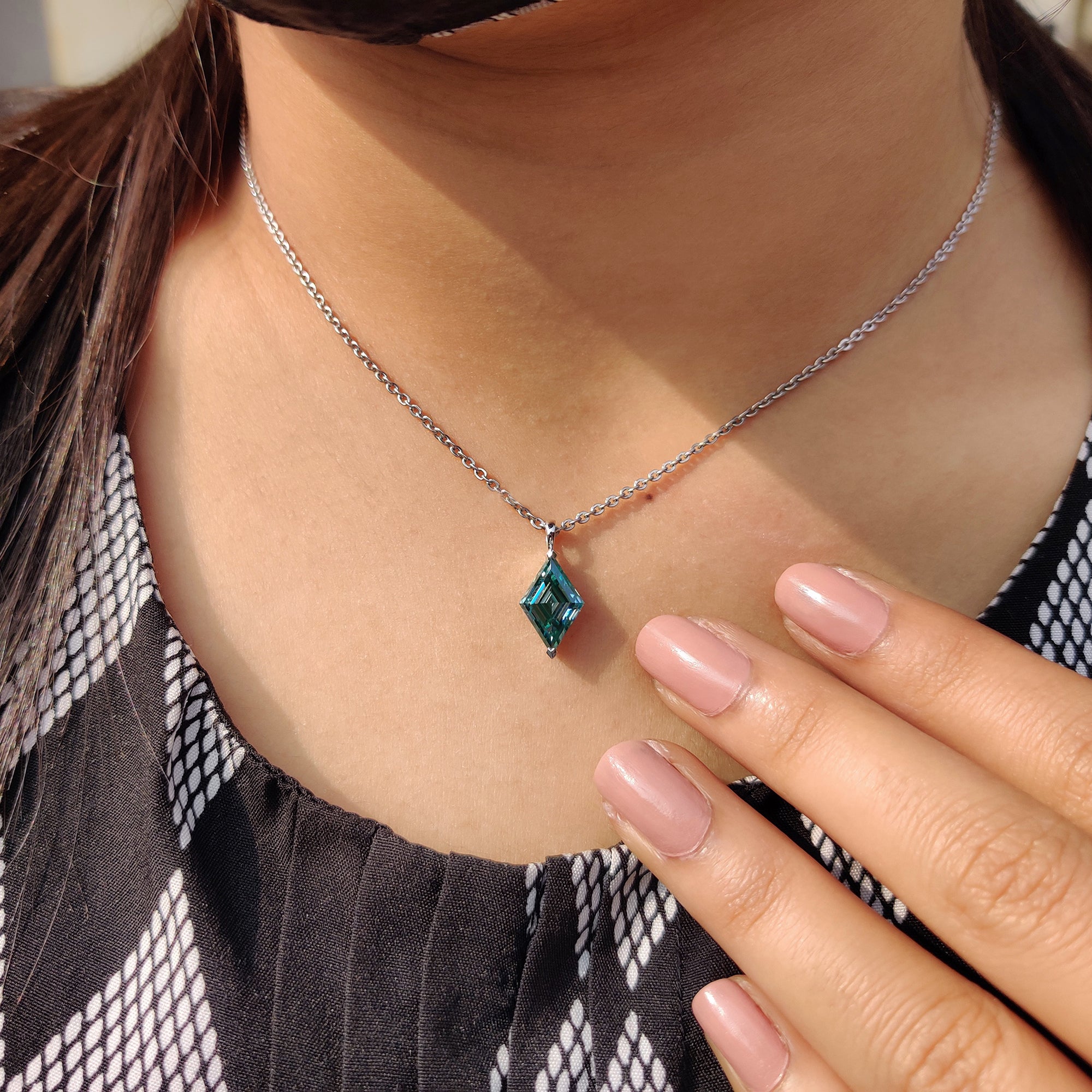 Anniversary Gifts for Her include custom moissanite pendant and white gold pendant.
