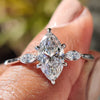 Marquise engagement ring with a stunning center diamond.
