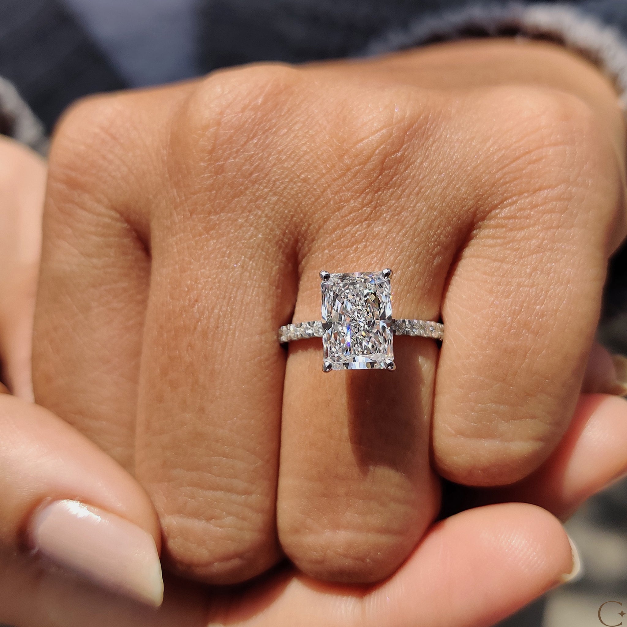 White gold diamond ring with a dazzling center stone.

