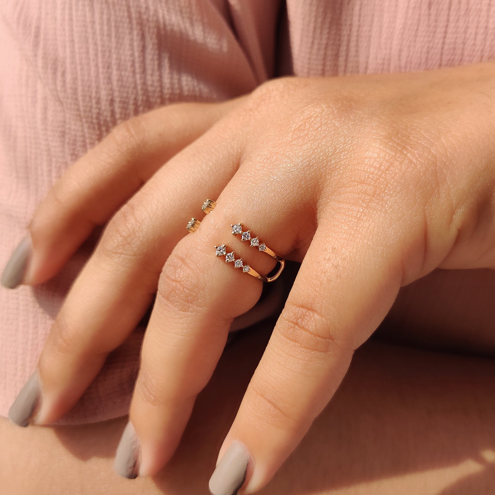 Carat Diamonds wedding band with a unique open gap.
