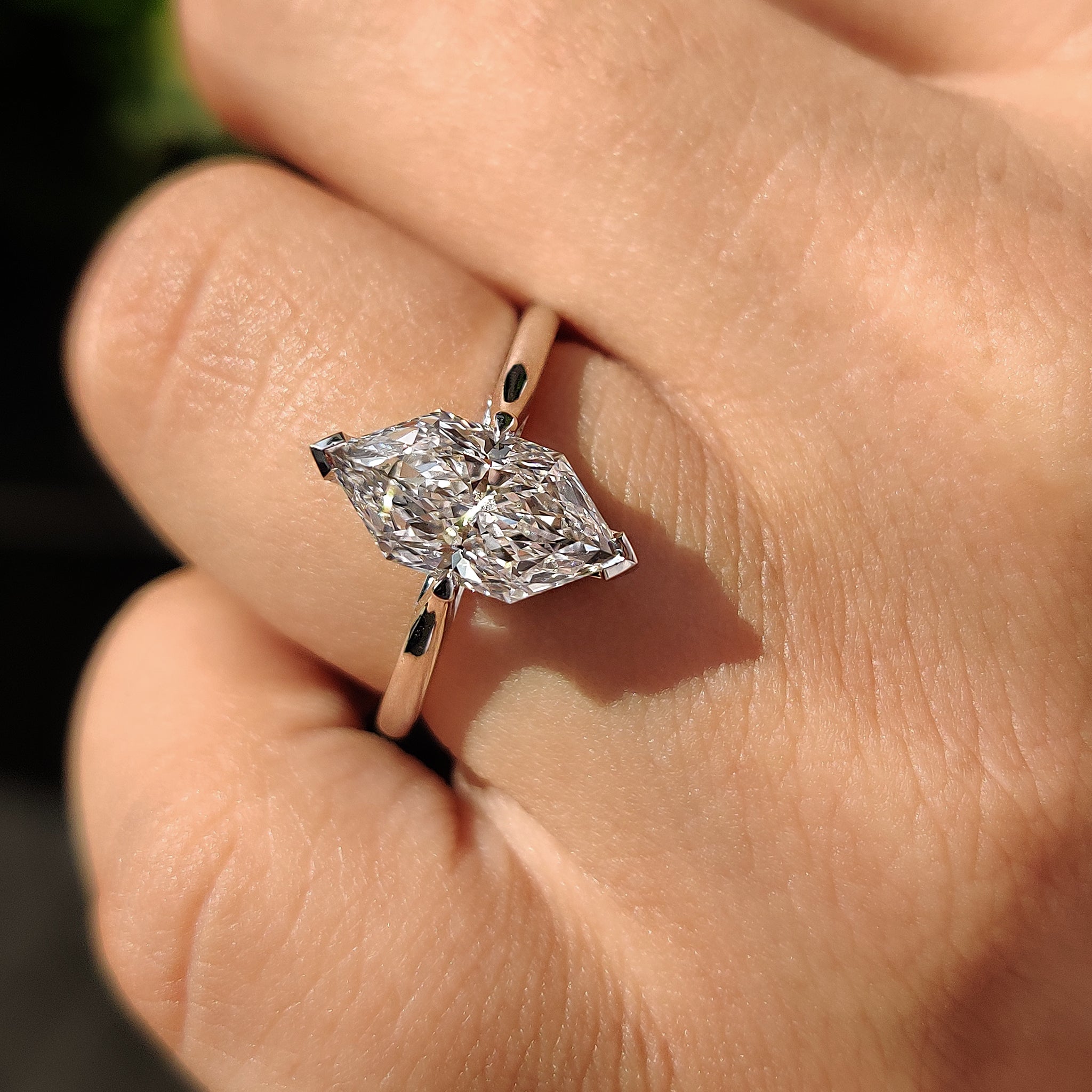 Cathedral setting ring with solitaire engagement ring.
