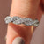 Handmade band featuring round cut diamonds.
