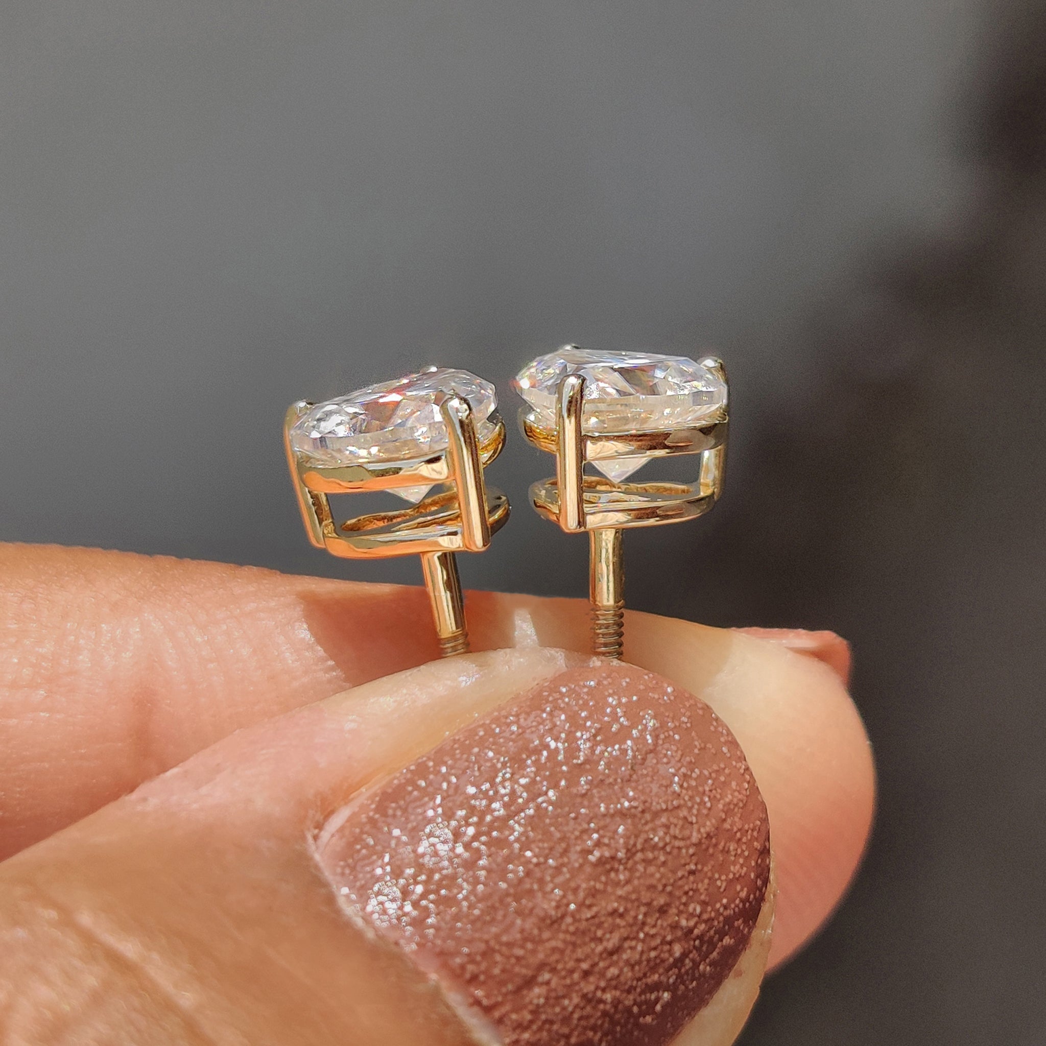 White gold stud earrings created with Heart Cut Moissanite Earrings in custom earrings style.

