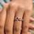 Round twisted band handcrafted with moissanite, ideal for stacking or wearing solo.