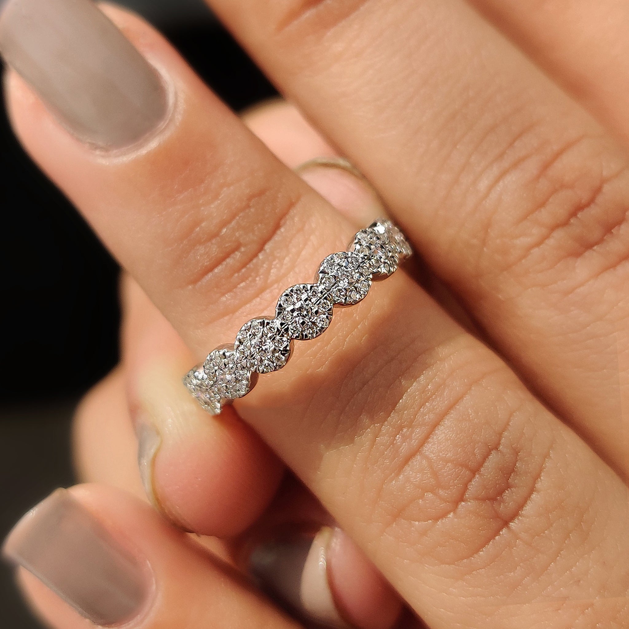 Round diamond wedding band featuring timeless elegance for your special day.