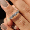 Round diamond wedding band featuring timeless elegance for your special day.