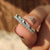 Double Wedding Band in white gold with round cut diamond.