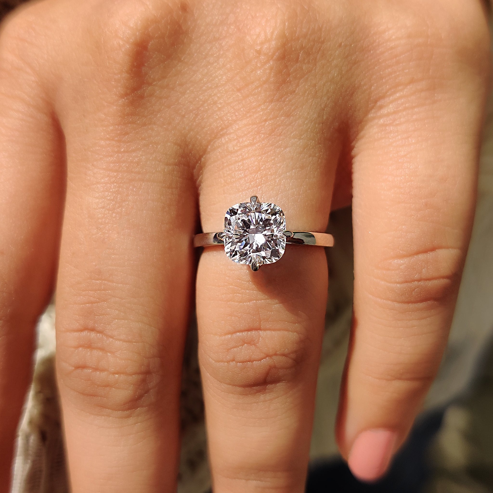 Lab grown diamond on cushion diamond ring.
