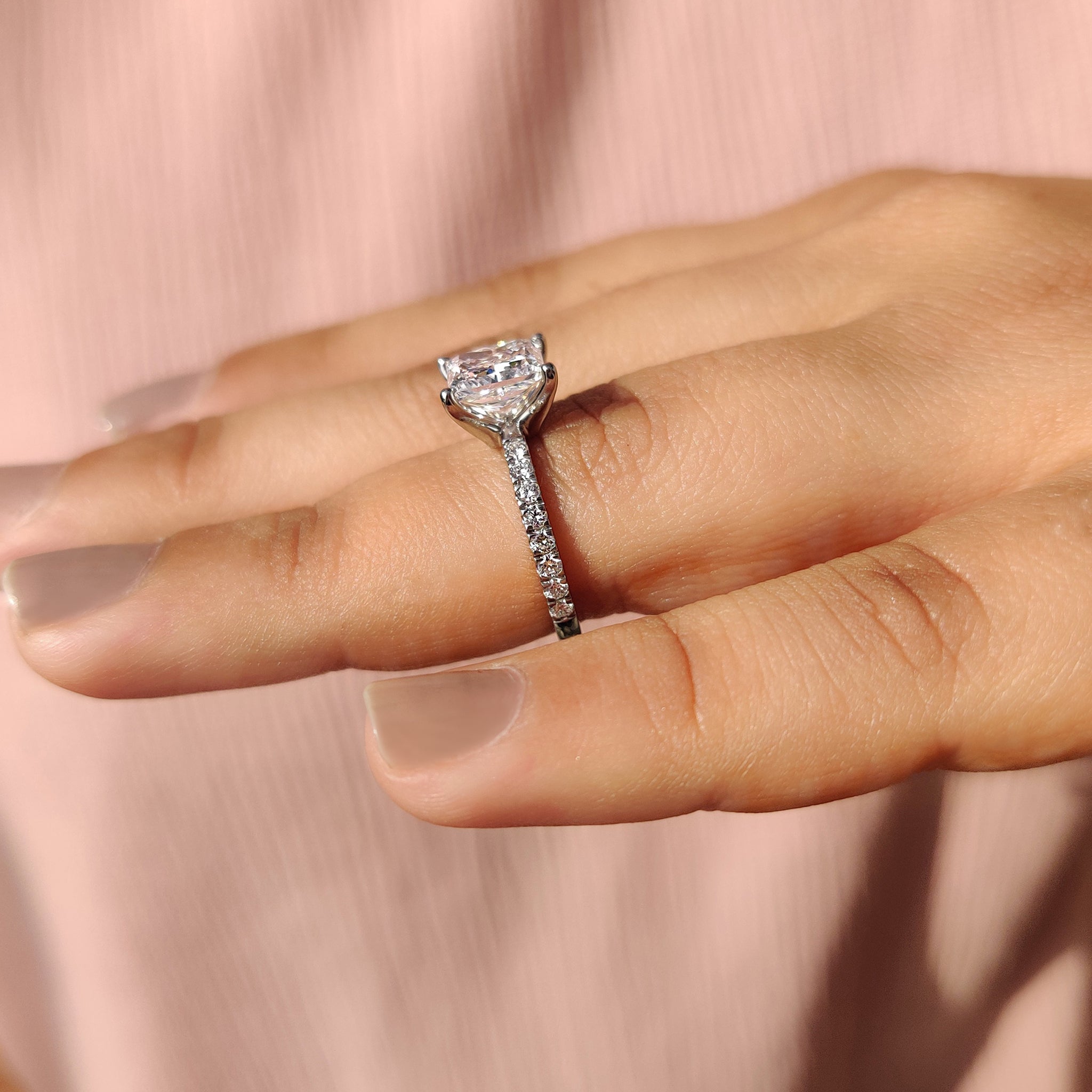 Round cut pave ring with dazzling diamond accents.
