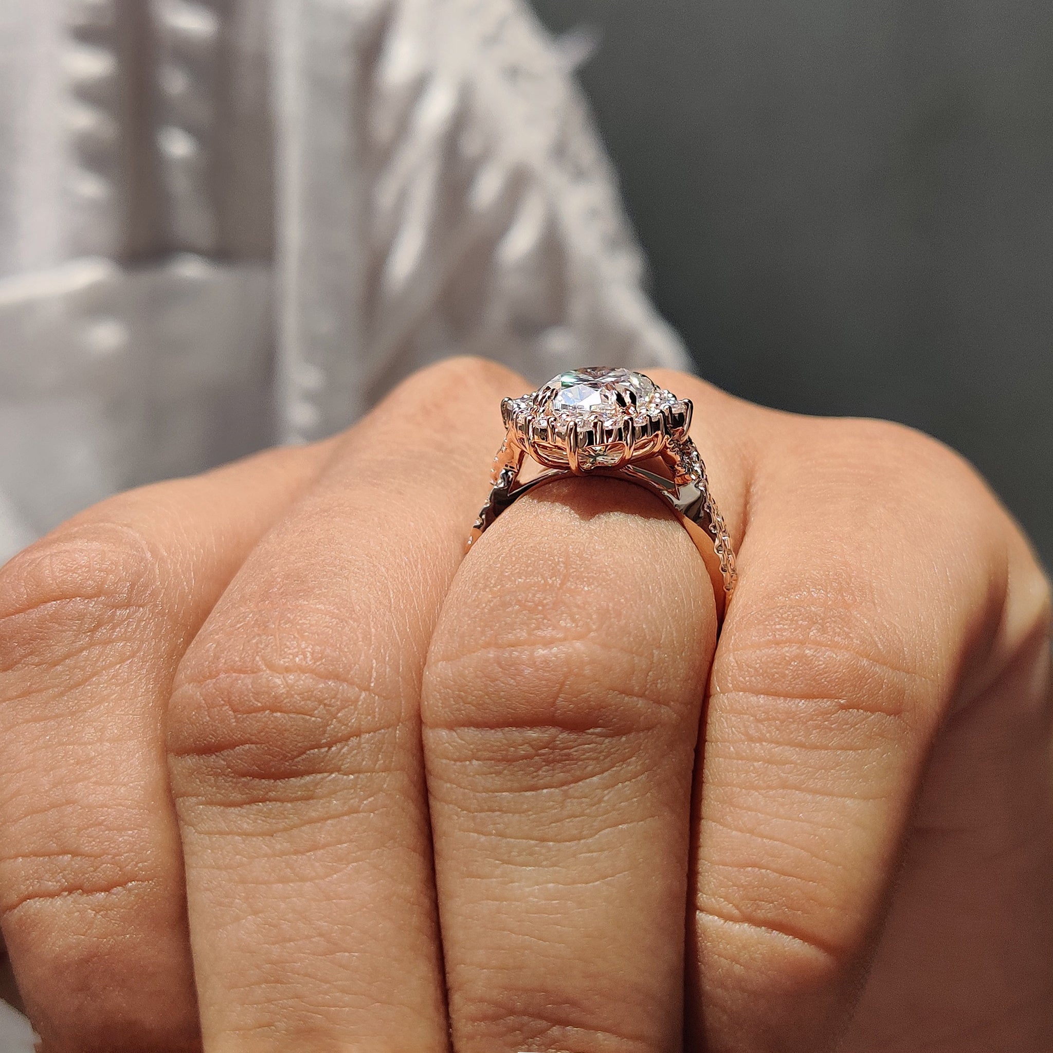 Twisted pave band adds motion and detailed character to the design.
