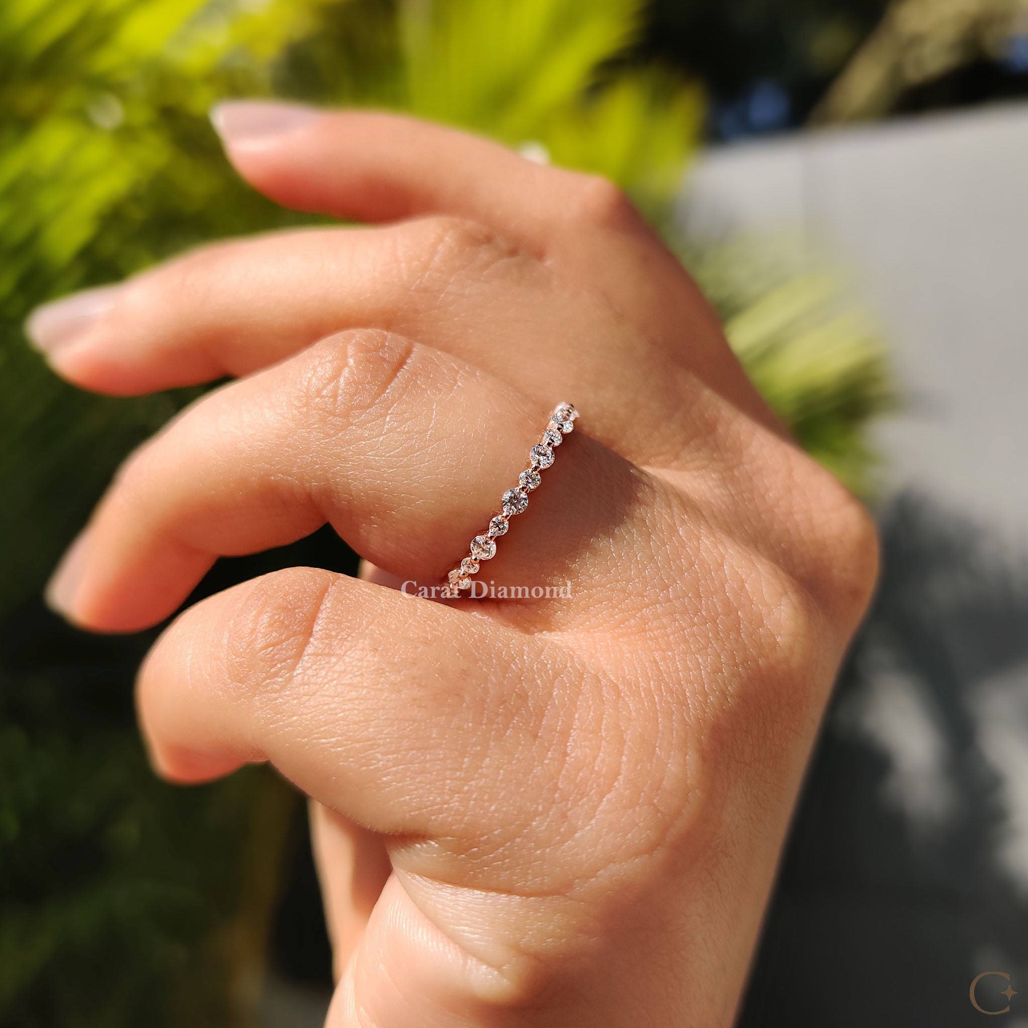 Shared prong eternity band with IGI-certified diamonds.