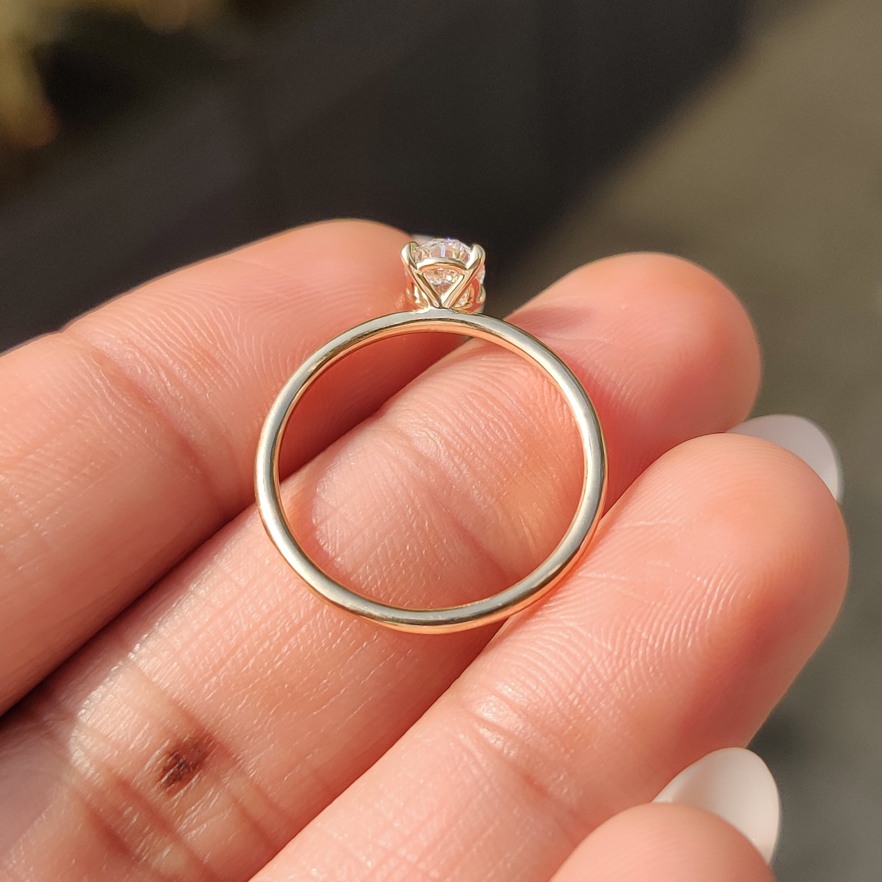 Oval Shaped Diamond Engagement Ring in Solitaire Setting