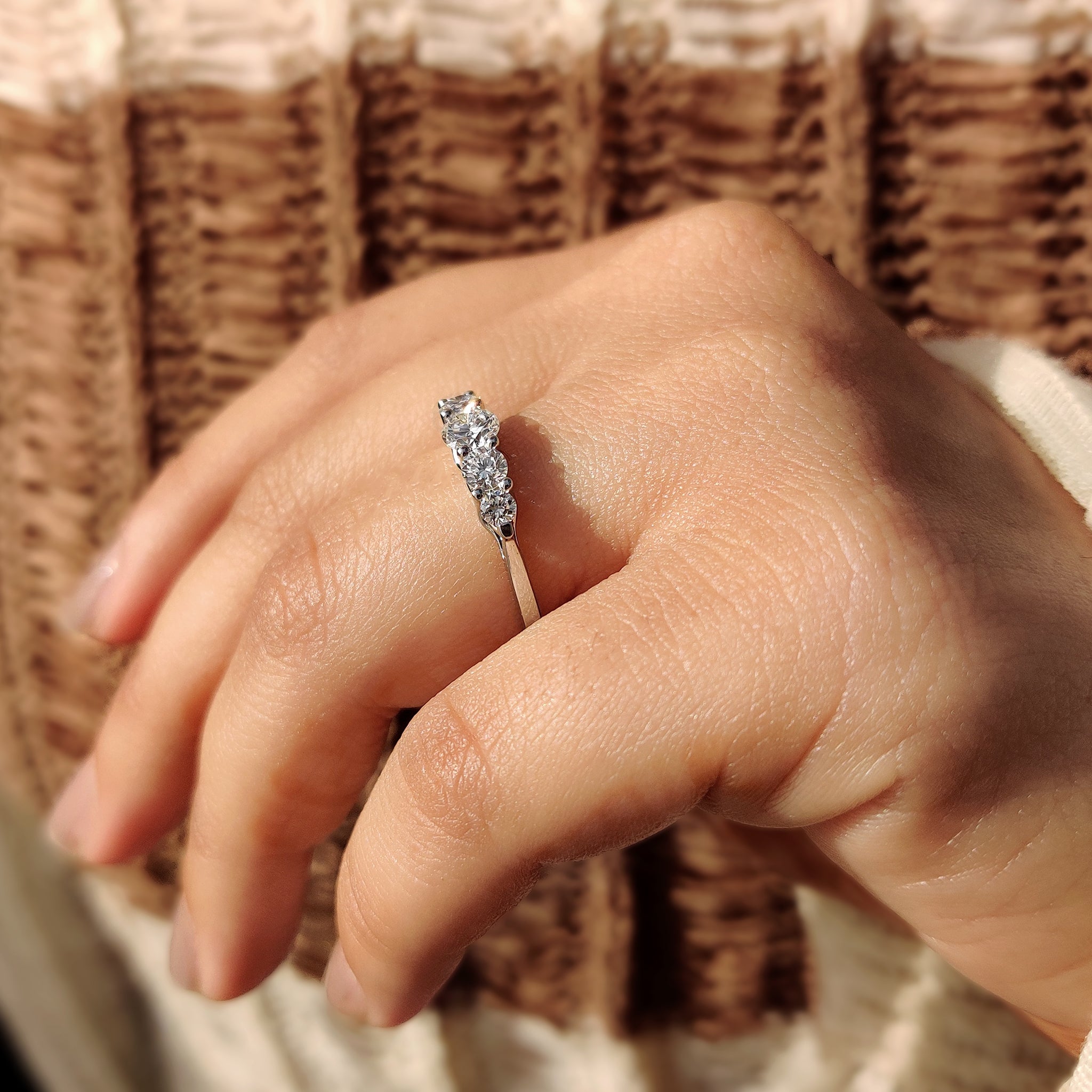 Prong set 5 stone lab grown diamond wedding band.
